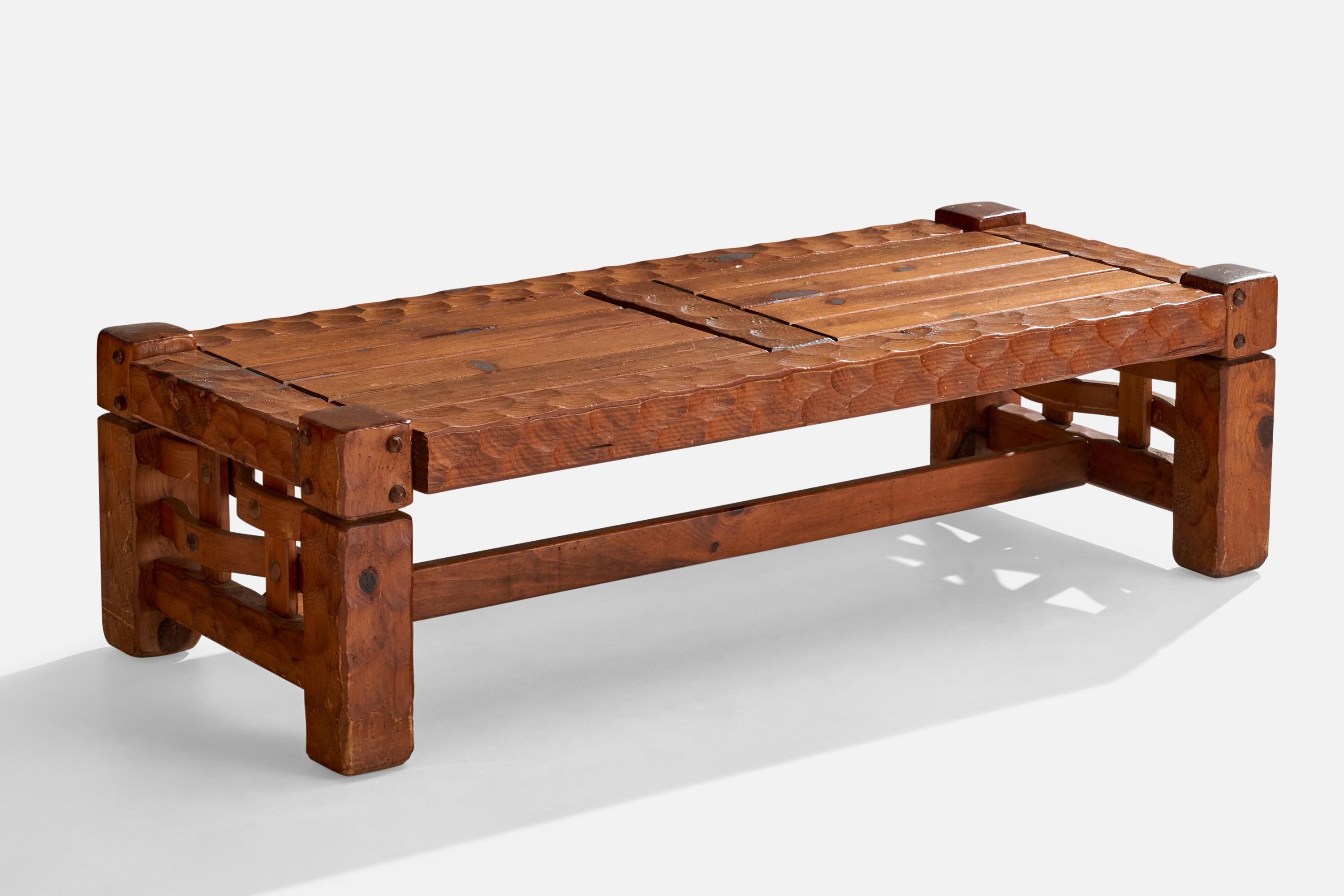 A carved pine coffee table designed and produced by Null Furniture, USA, c. 1970s.