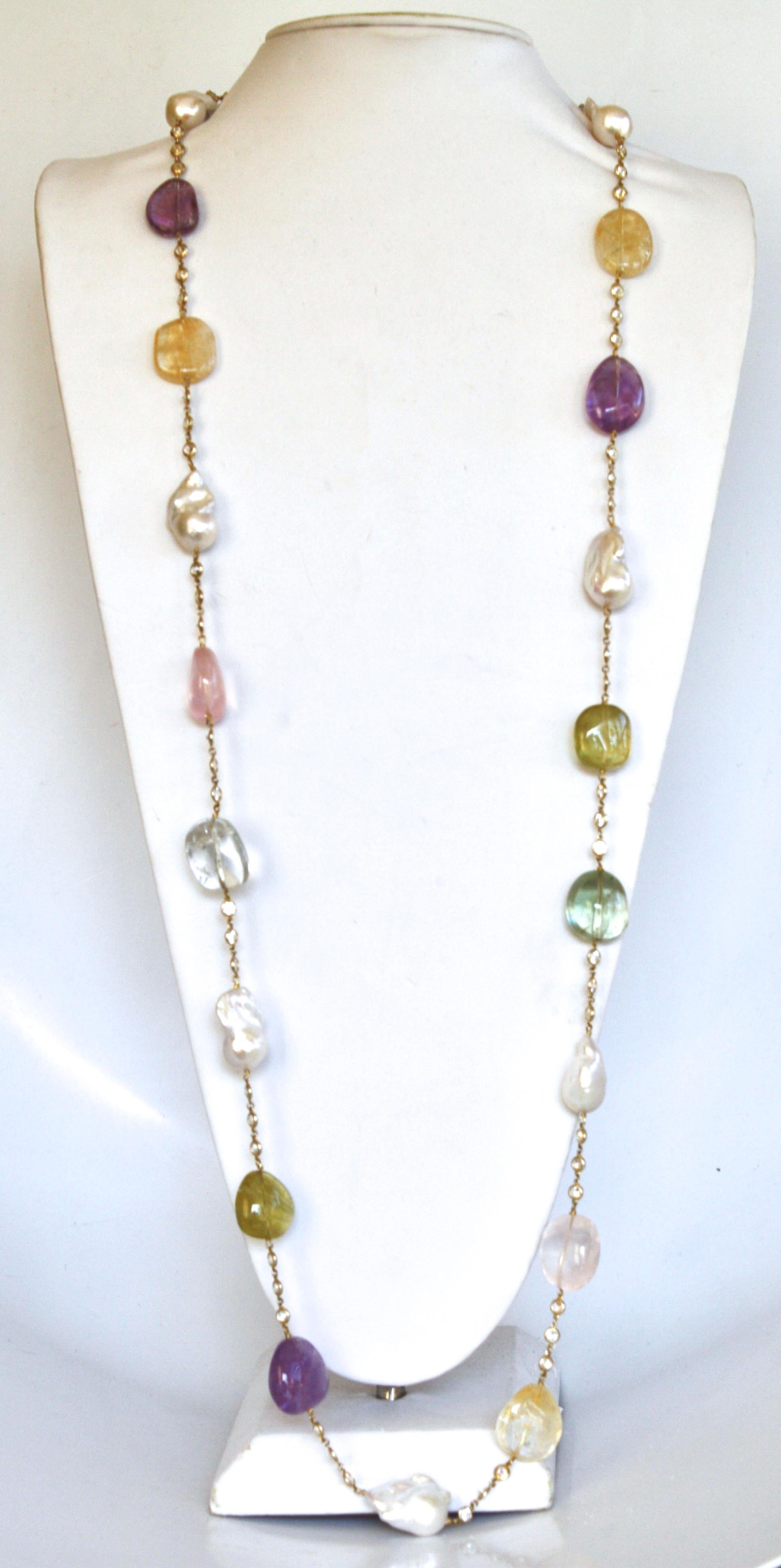 Bijoux Num Aquamarine, Amethyst, Lemon Quartz, Baroque Pearl, & Pink Quartz Necklace with CZ's on gold plated chain. 