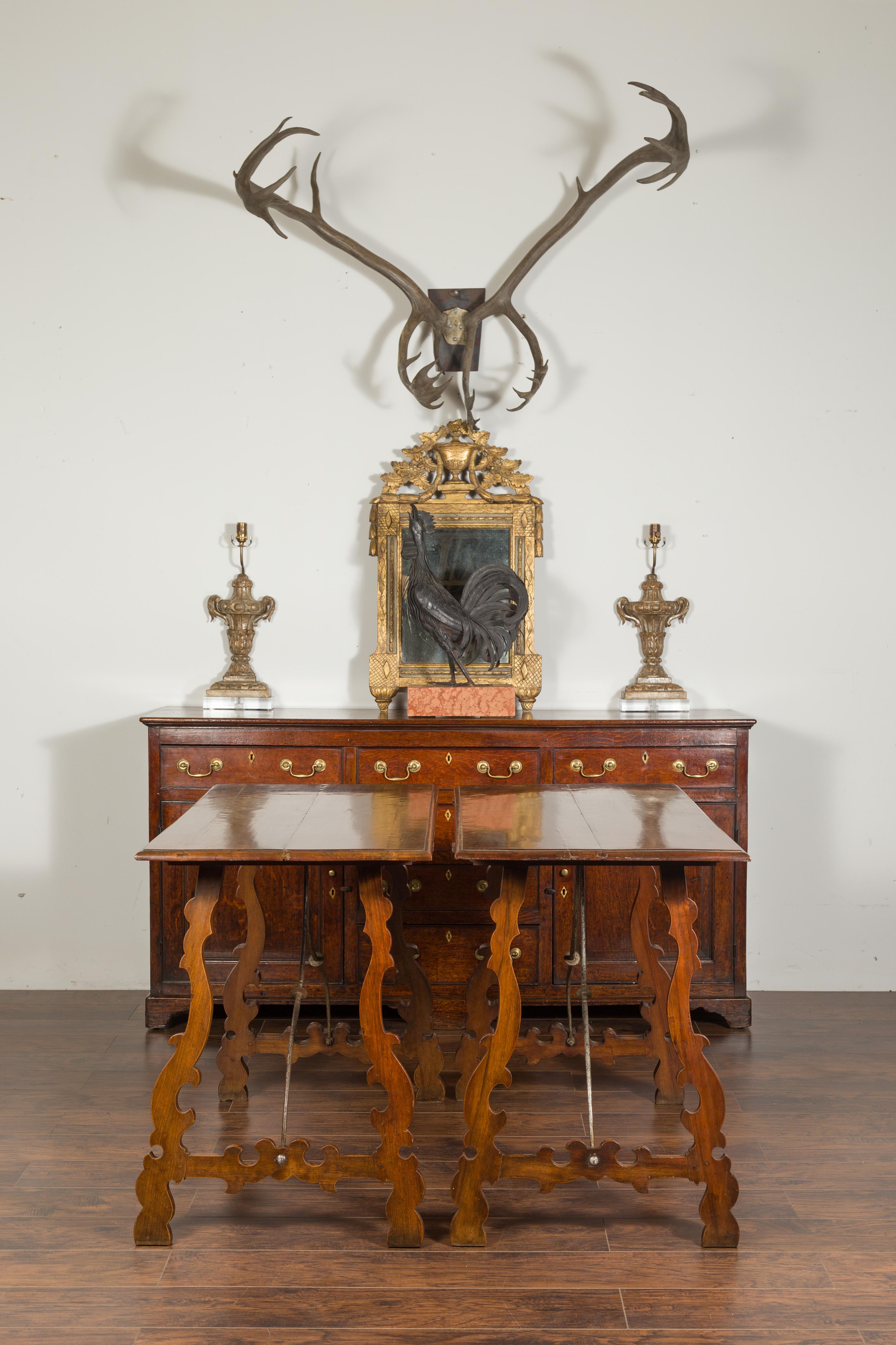 19th Century Pair of Spanish Baroque Style 1880s Walnut Console Tables with Iron Stretchers For Sale