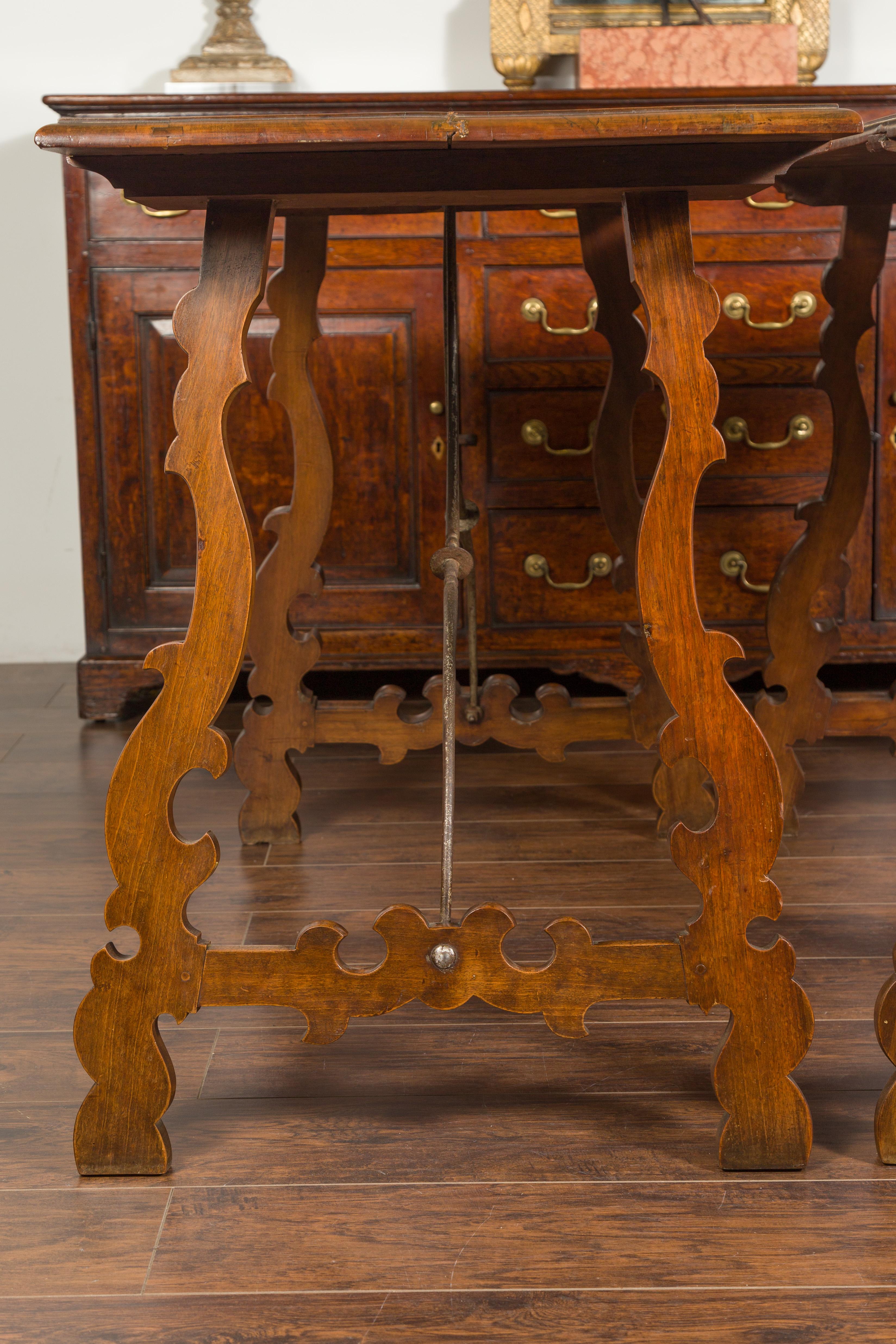 Pair of Spanish Baroque Style 1880s Walnut Console Tables with Iron Stretchers For Sale 1