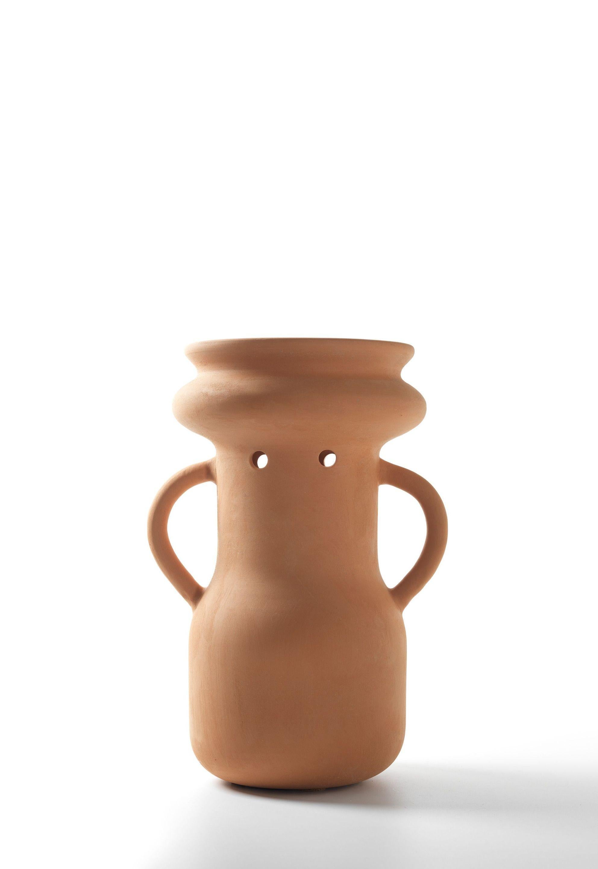 Number 4 gardenia vase by Jaime Hayon 
Dimensions: Diameter 26 x Height 37 cm 
Materials: Handmade terracotta with a waterproof treatment.
Could be used outdoors. Also available in two other designs.


Jaime Hayon designed the Gardenia Vases
