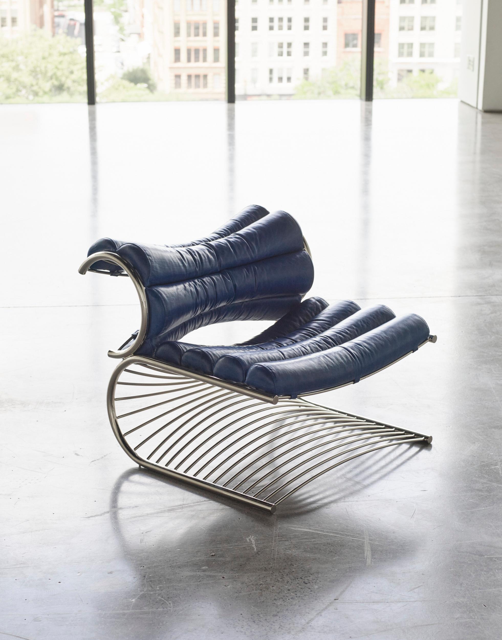 Number two fauteuil by Rue Intérieure
Dimensions: 78.74 x 68.58 x H 66.04 cm
Materials: Steel, leather
Designed and made in Montreal, Canada.

Other leather and metal finishes available. 

Clear lines and beautiful curves intertwined to