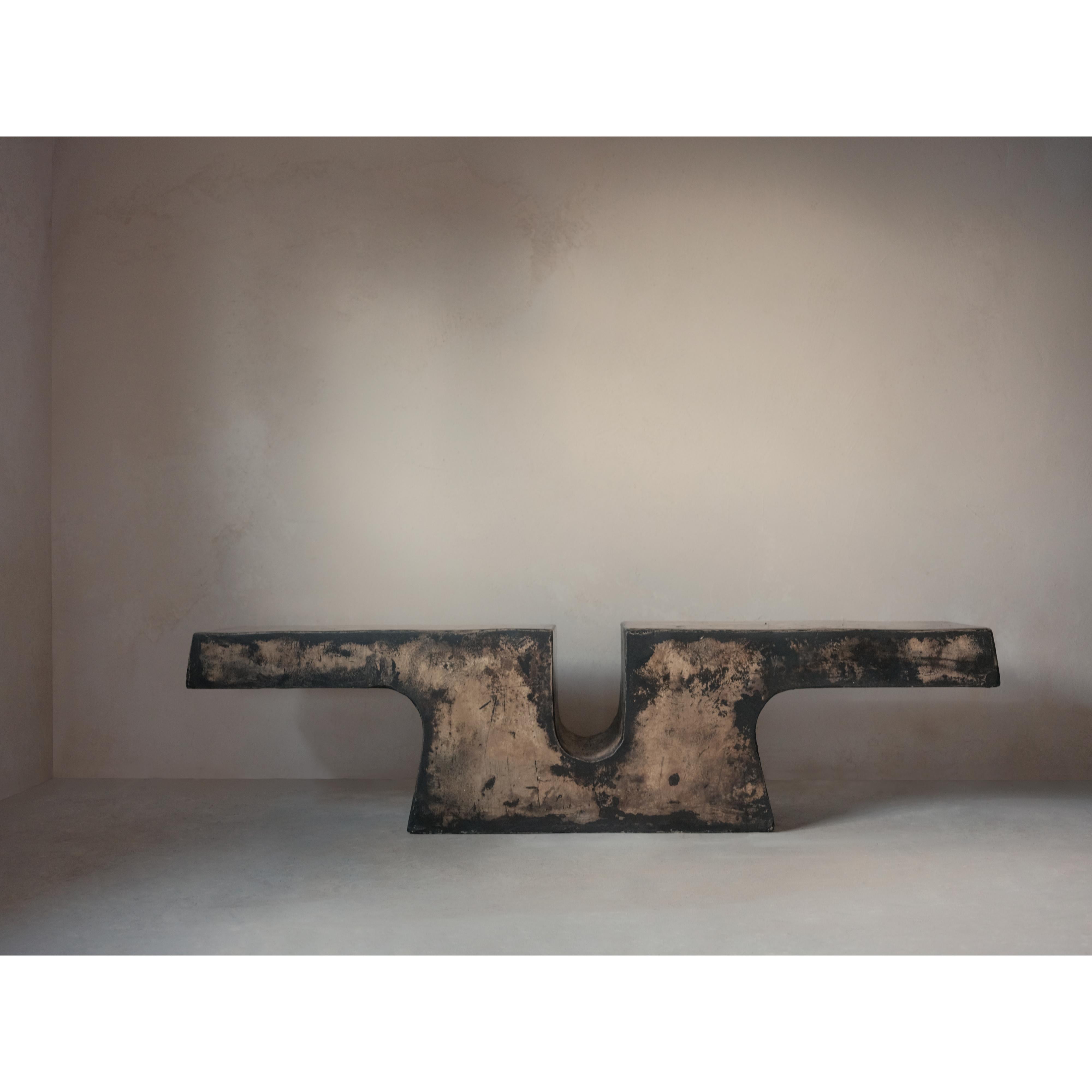 Nunna, Unique Coffee Table in Hemp Crete by Lucas Tyra Morten
Edition: Limited Edition of 13
Dimensions: W 180 x D 40 x H 44 cm
Material: Hemp Crete, coffee/tee dyed, waxed with pigmented linseed oil 
Can be made in a light or dark version (either