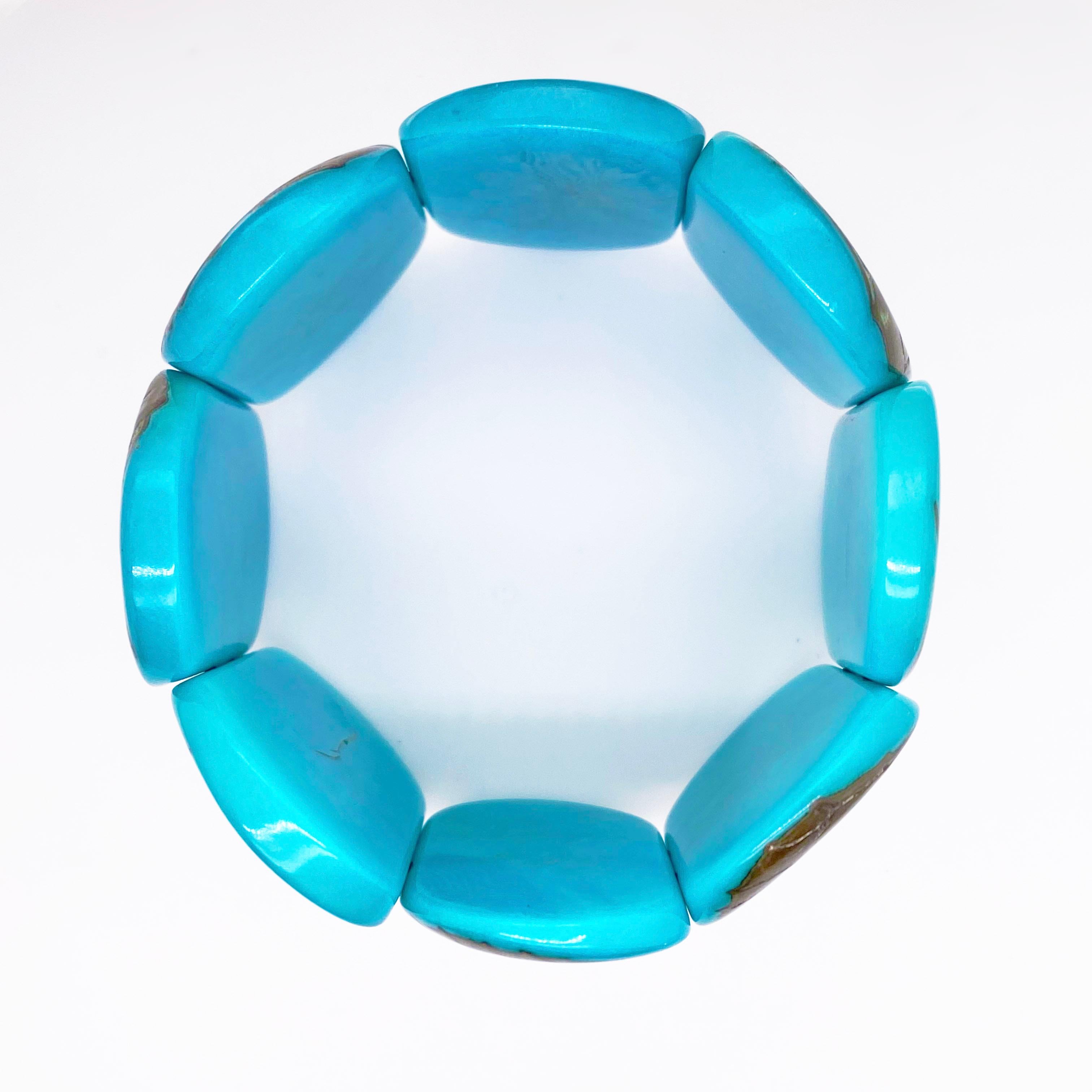 Turquoise color is so in that people are buying shag rugs, couches, clothes, and even wrapping their vehicles in this color! This statement bracelet is that color! Made from a nut that only is found in very remote locations, this design is surely to
