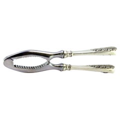 Nutcracker with embossed silver handles