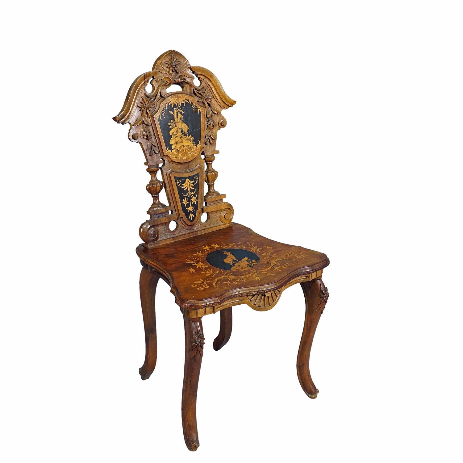 Nutwood Edelweis Marquetry Chair Swiss Brienz 1900

A wonderful inlayed nutwood chair decorated with inlayed and painted sceneries depicting chamois, goat and edelweis flowers. Surrounded by ebony and lindenwood marquetry. Manufactured ca. 1900 in