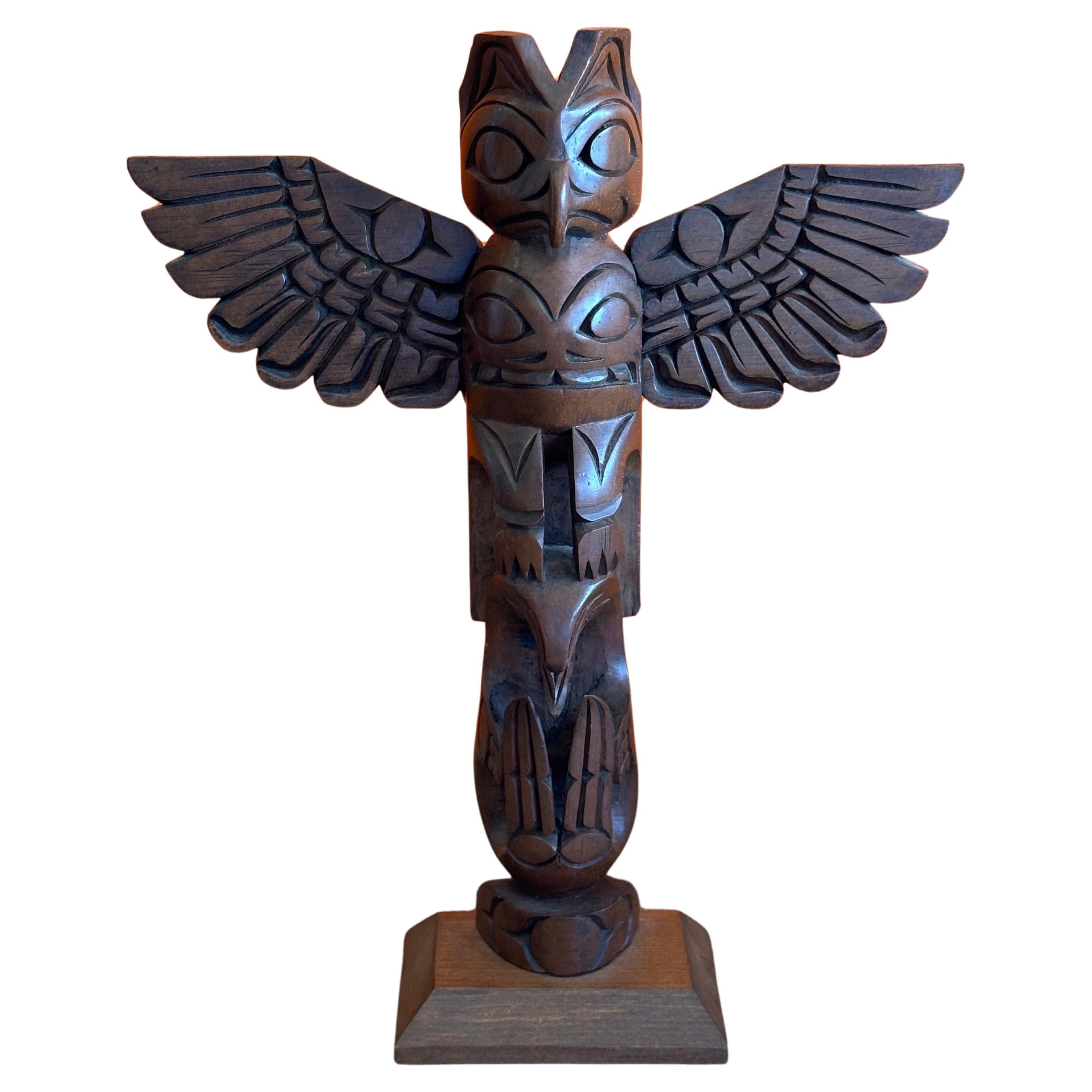A fine example of a Nuu-chah-nulth northwest coast hand carved wood TOTEM pole by master carver John Williams, circa 1980s. Williams was the son of famed carver, Ray Williams, and Grandson to Sam Williams who started carving for the 