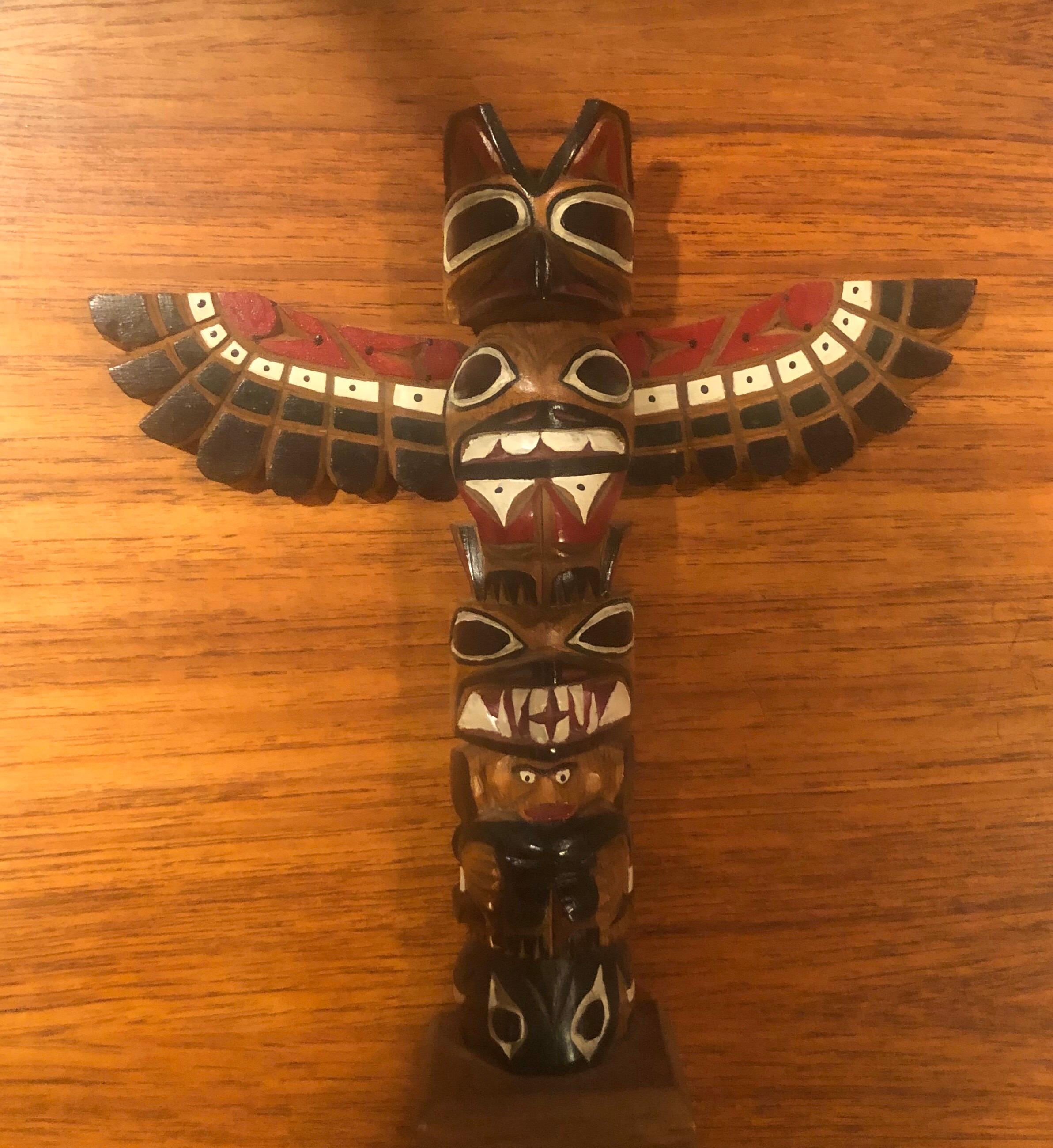 A fine example attributed to master Nuu-chah-nulth carver Ray Williams, circa 1960s. Ray Williams was the son of famed carver Sam Williams who started carving for the Ye Olde Curiosity shop in Seattle, WA in the early 1900s. This example features