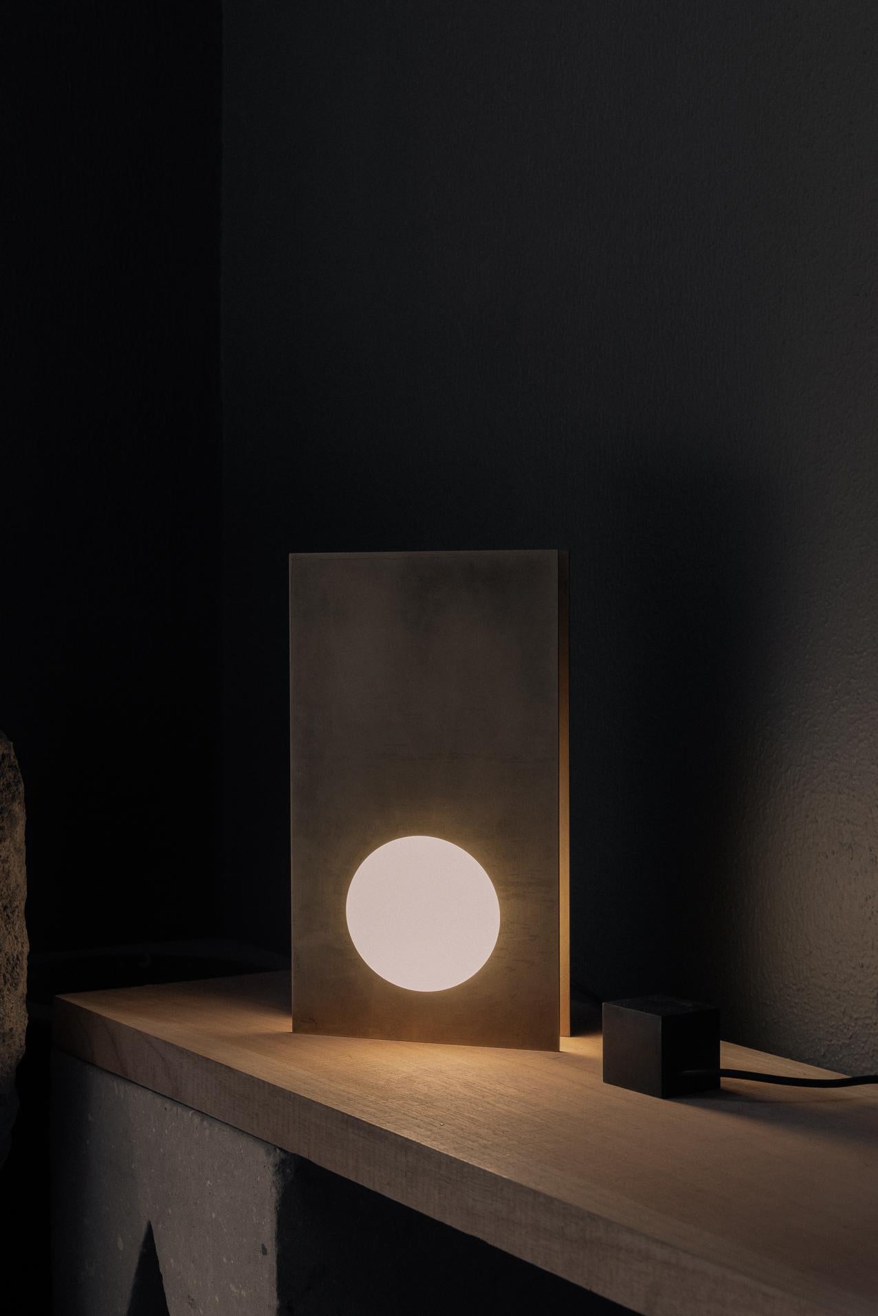 Contemporary Nuum Table Lamp in Aged Brass with Opal Glass Sphere by Nuumbra For Sale