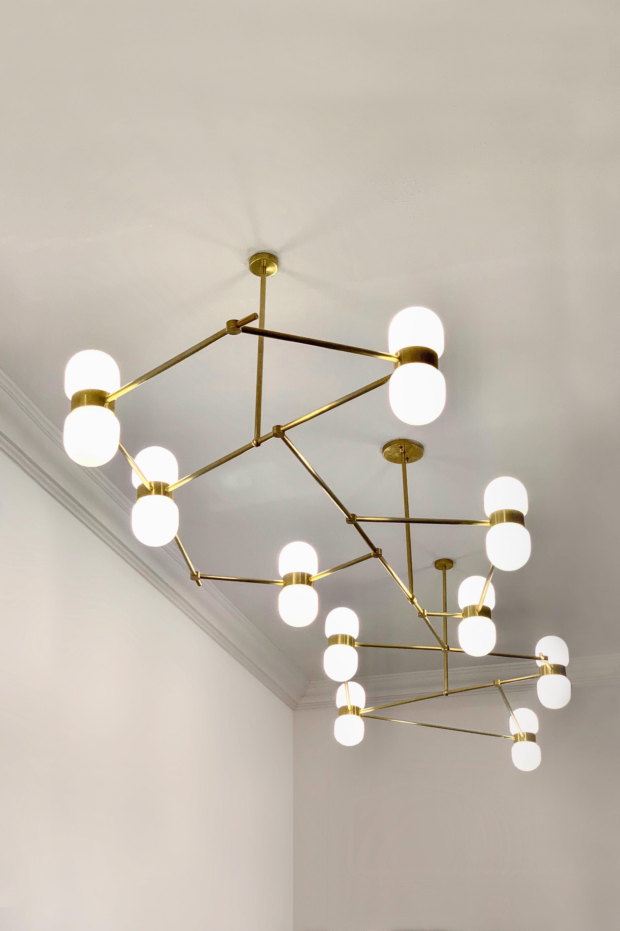 Nuvol chandelier 10 lamps by Contain
Dimensions: D 270 x W 20 x H 140 cm
Materials: brass structure and matte or glossy glass.
Available in different finishes and dimensions. 

All our lamps can be wired according to each country. If sold to