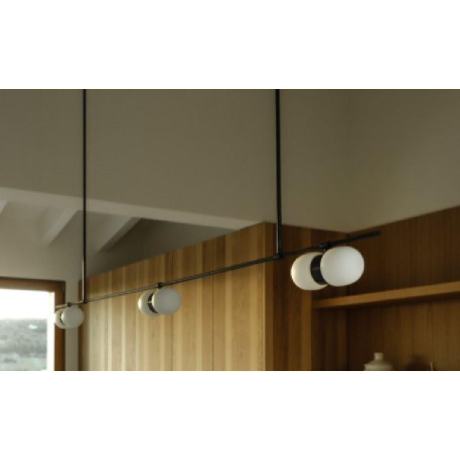 Nuvol chandelier Hilo Horizontal by Contain
Dimensions: D290 x H23 x H100 cm (Customizable dimensions)
Materials: Brass structure and matte or glossy glass.
Available in different finishes and dimensions.

All our lamps can be wired according