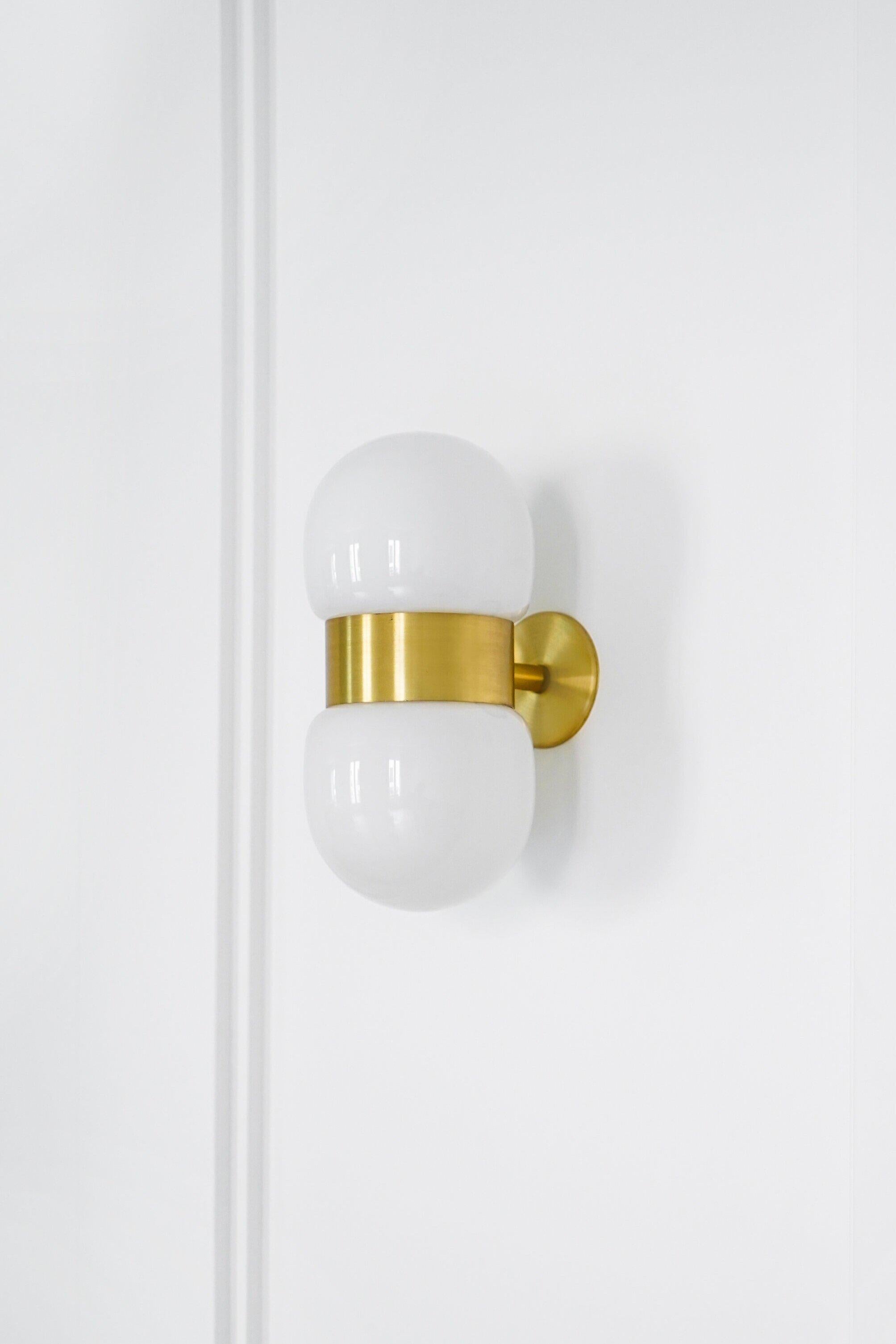 Nuvol double brass wall light by Contain
Dimensions: D10 x W23 x H15cm 
Materials: Brass, 3D printed PLA structure and matte or glossy glass.
Available in different finishes.

All our lamps can be wired according to each country. If sold to the