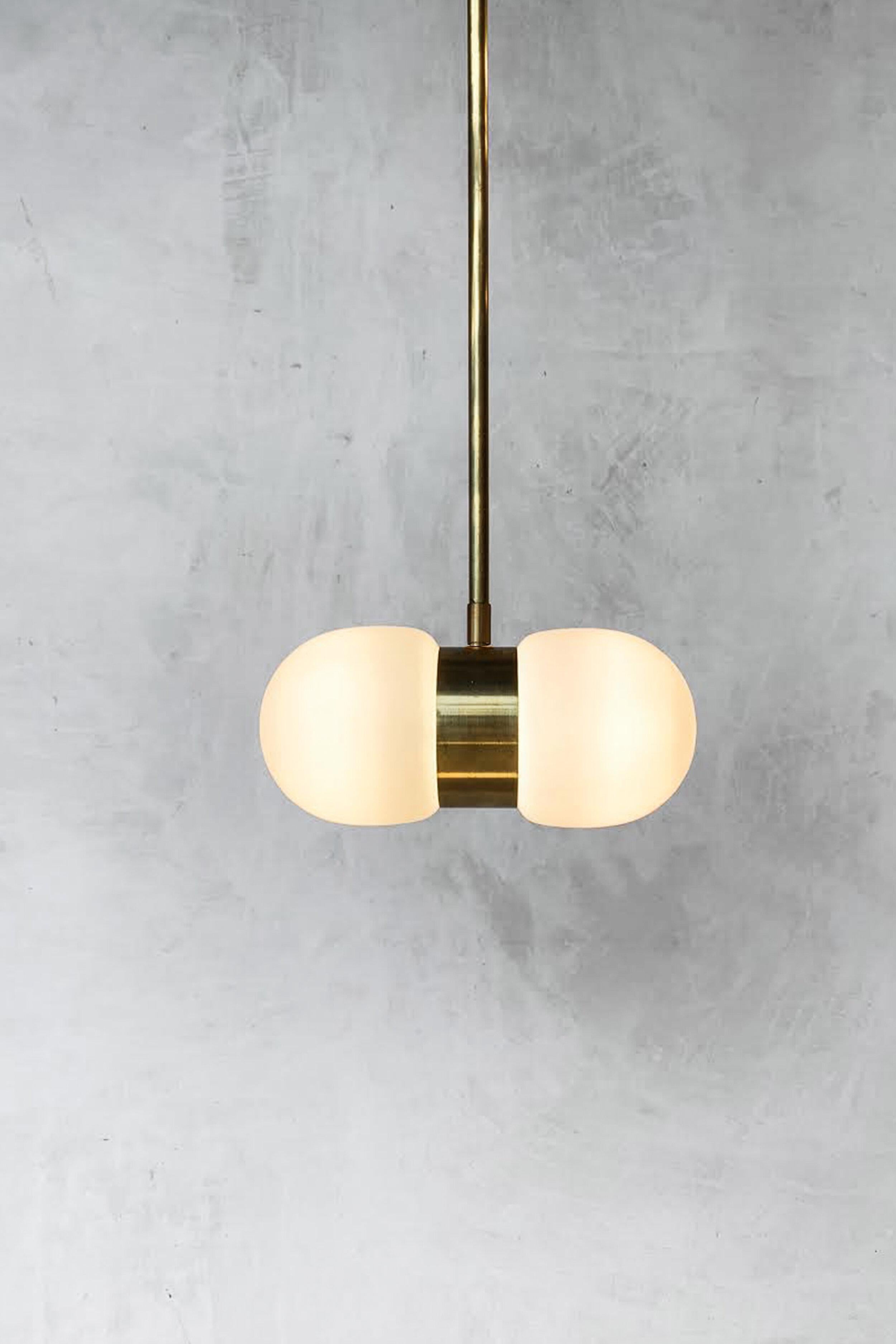 Nuvol double long pendant by Contain
Dimensions: D21.5 x W50 x H10cm 
Materials: brass structure and matte or glossy glass.
Available in different finishes. 

All our lamps can be wired according to each country. If sold to the USA it will be