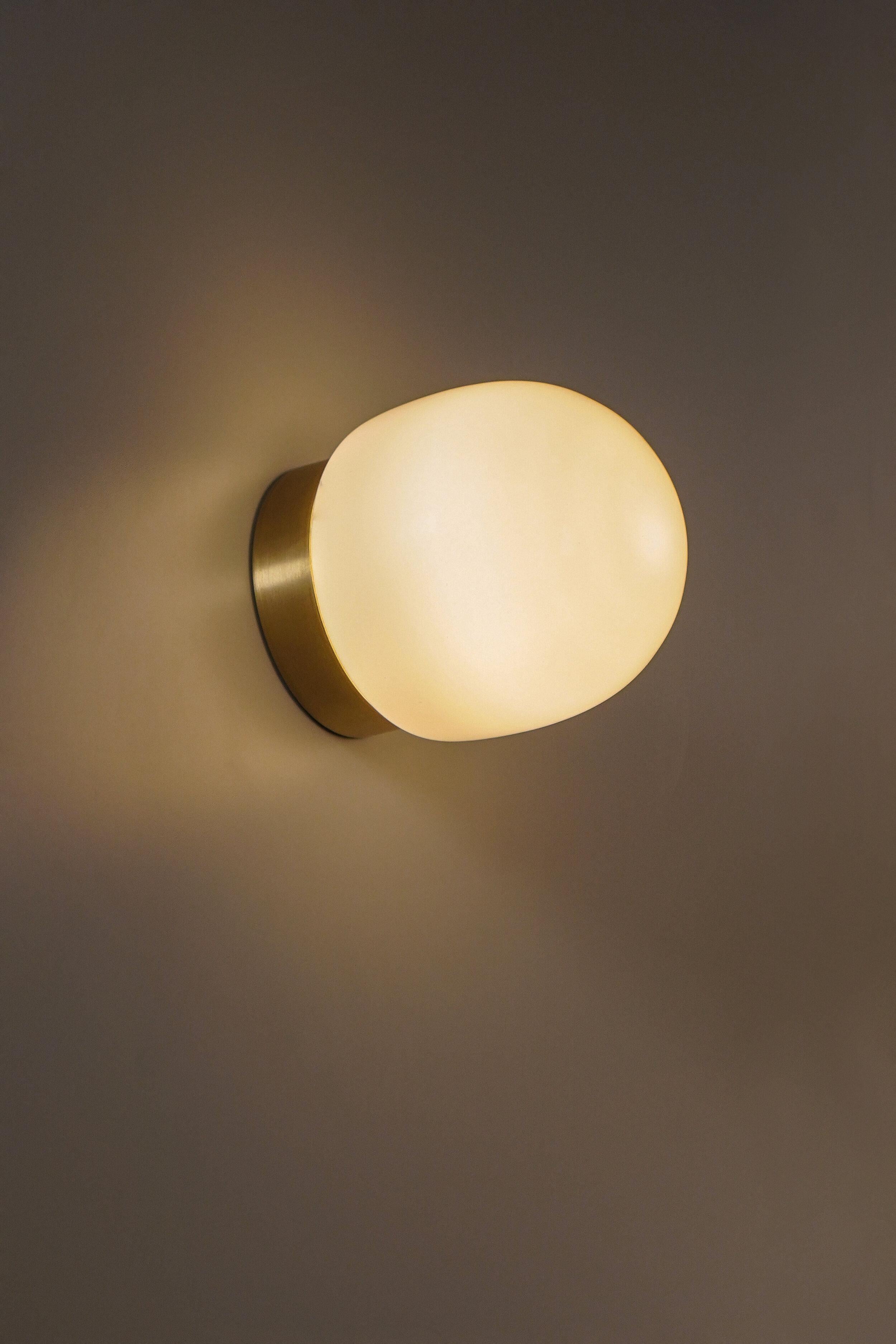 Nuvol simple wall light by Contain.
Dimensions: D 10 x H 11 cm 
Materials: brass structure and opal glass.
Available in different finishes. 

All our lamps can be wired according to each country. If sold to the USA it will be wired for the USA
