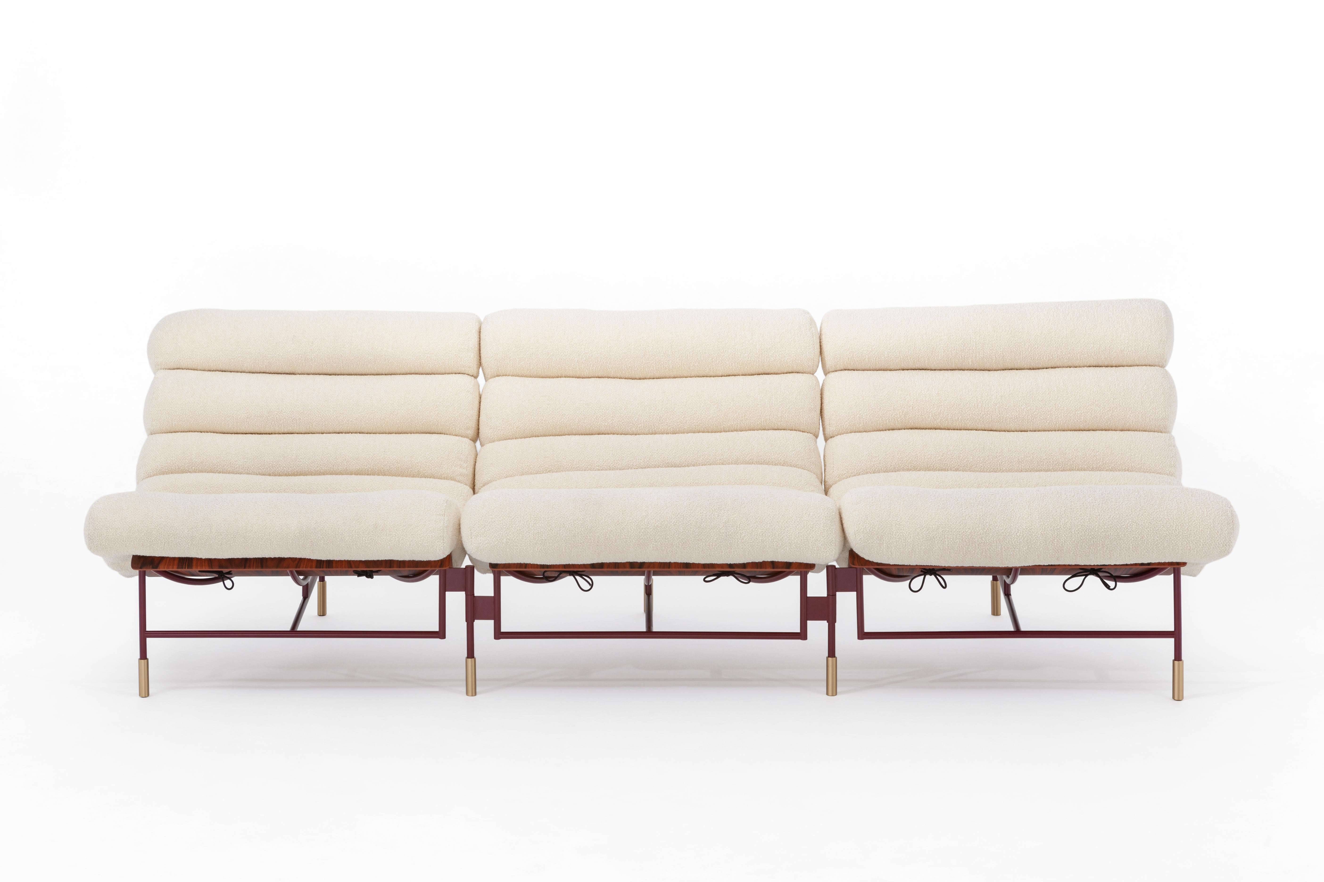 Nuvola sofa by SEM
Dimensions: D235 x W82 x H72 cm
Material: Structure in lacquered iron, brass details, shell in Santos rosewood,
Padding in feather with upholstery in leather.
Costumized leather and fabric available on request.

By