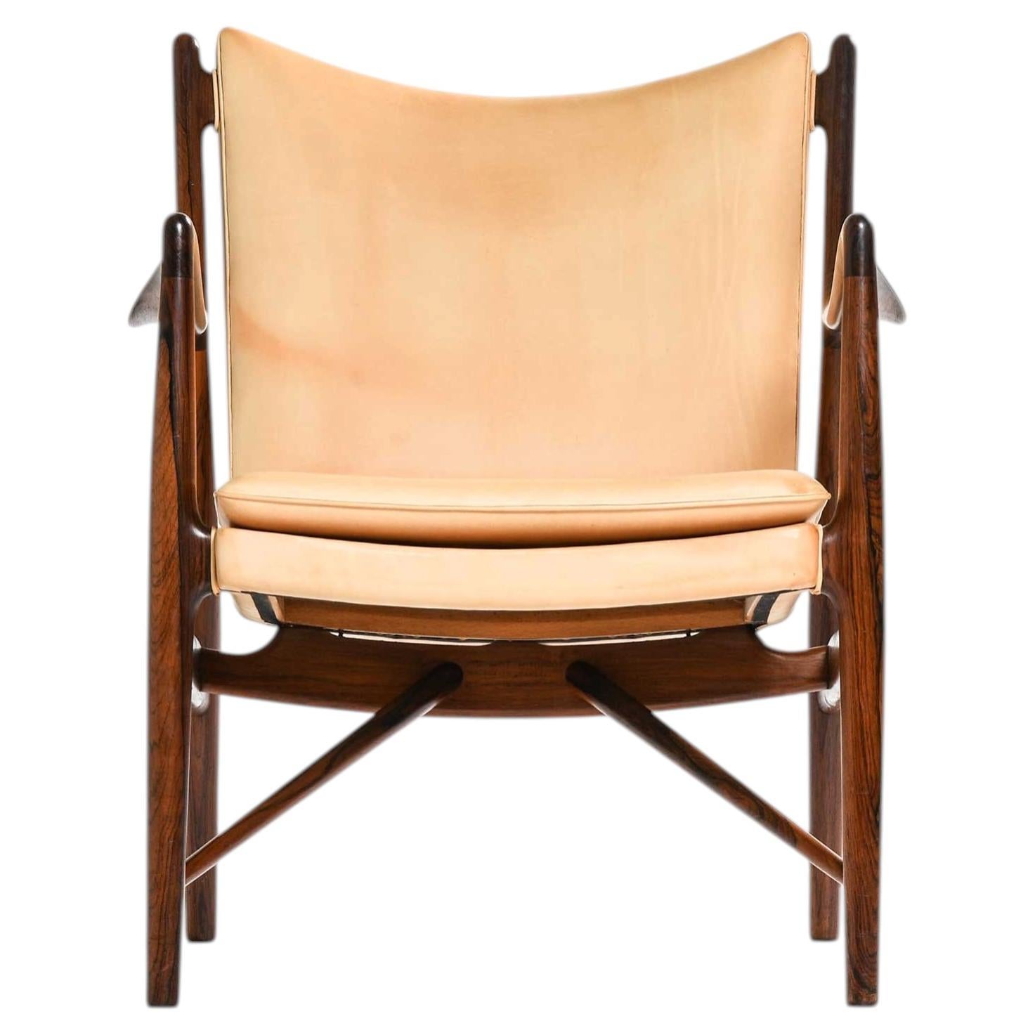 NV-45 Easy Chair in Rosewood & Leather by Finn Juhl, 1945 For Sale