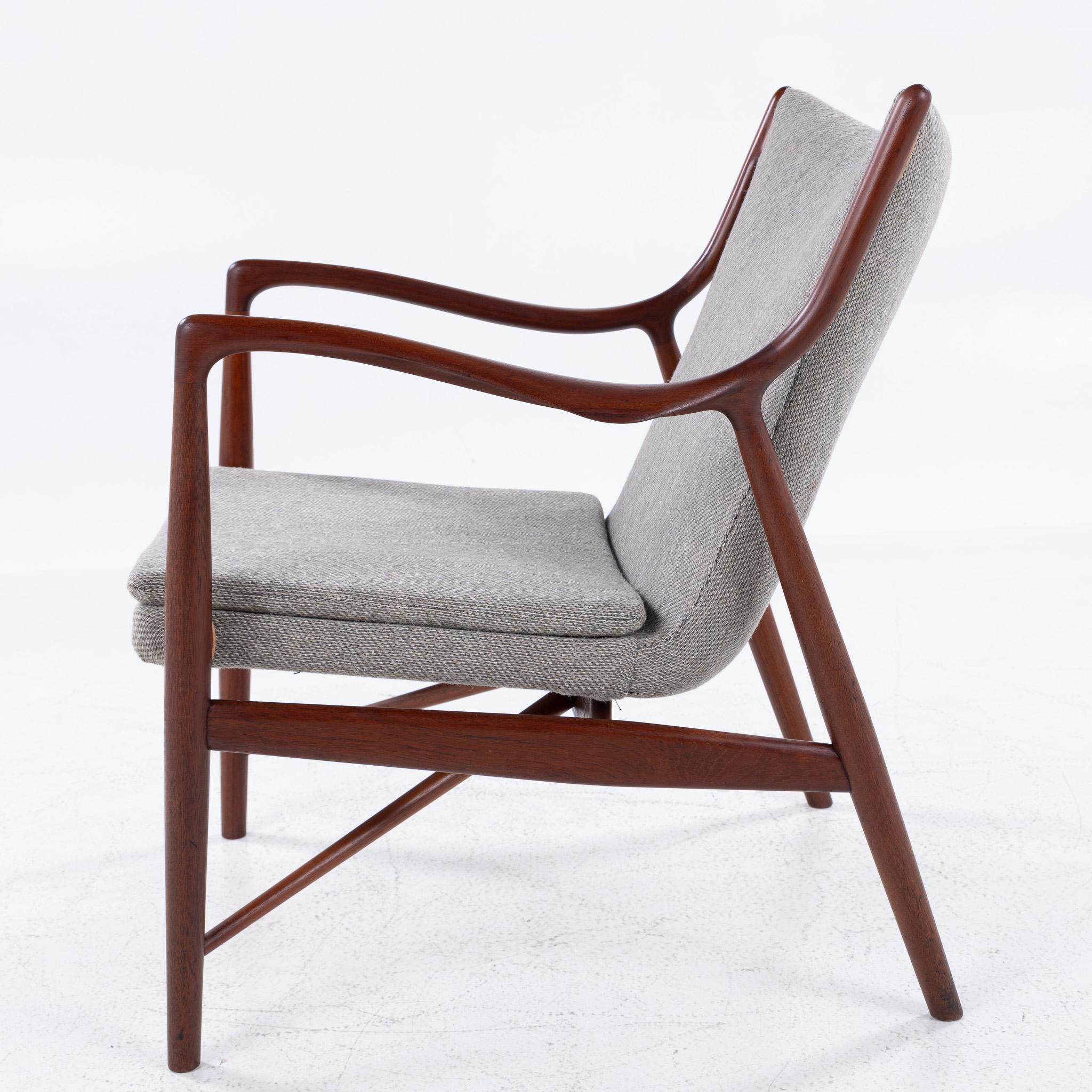 Danish NV 45 - Rare easy chair in solid teak by Finn Juhl