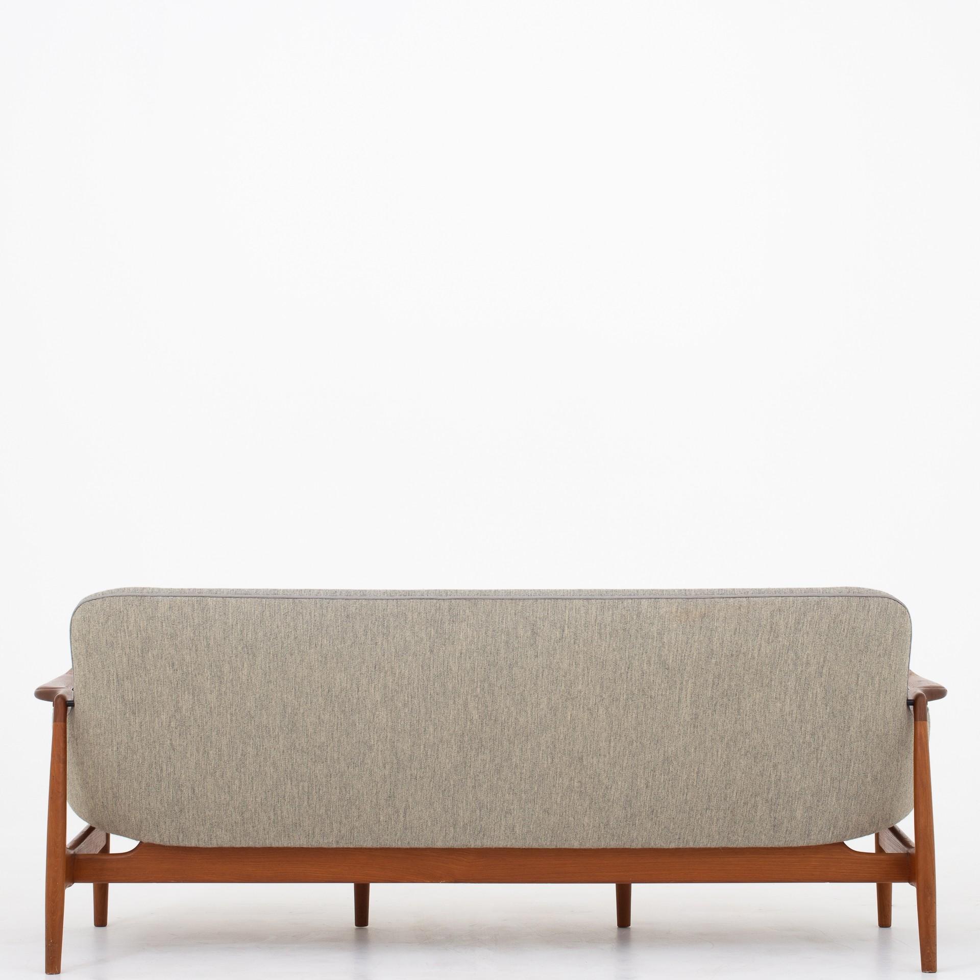 NV 53 - 3-seat sofa in teak and original, grey wool. Designed in 1953. Maker Niels Vodder.