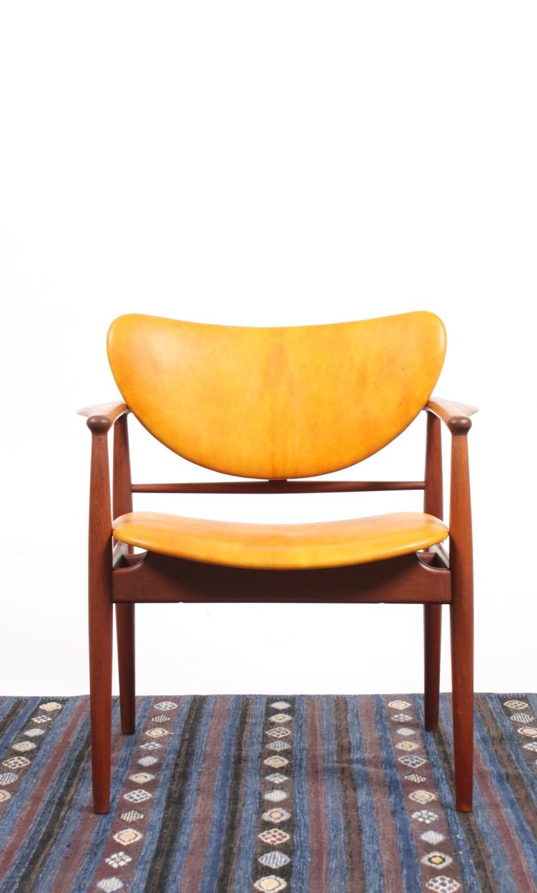 NV48 armchair in teak and niger leather designed by Finn Juhl M.A.A. for Niels Vodder cabinetmakers. Made in Denmark, Great original condition.
