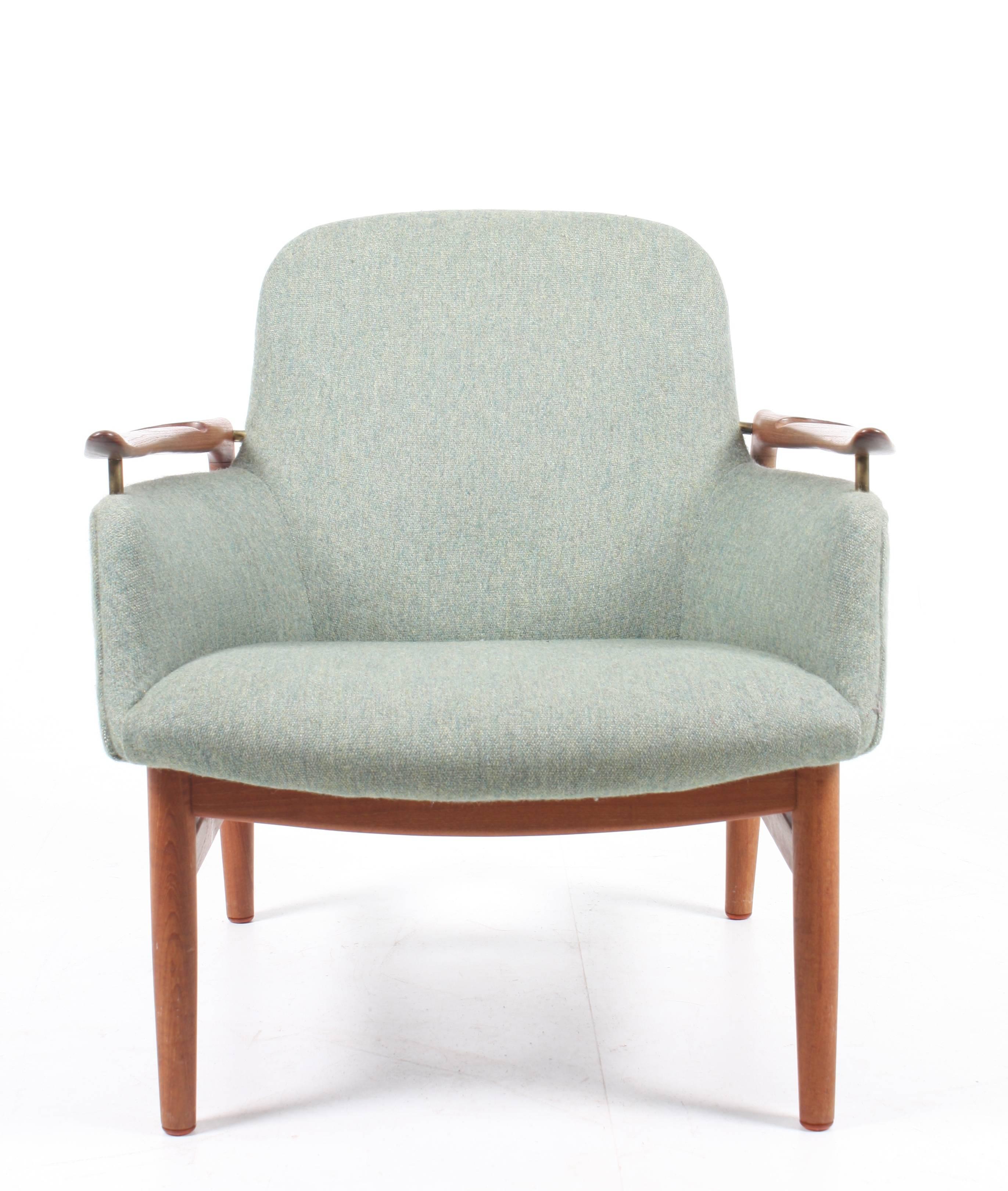 NV53 lounge chair in teak and fabric designed by Finn Juhl M.A.A. for Niels Vodder cabinetmakers in 1953. Made in Denmark, Great original condition.