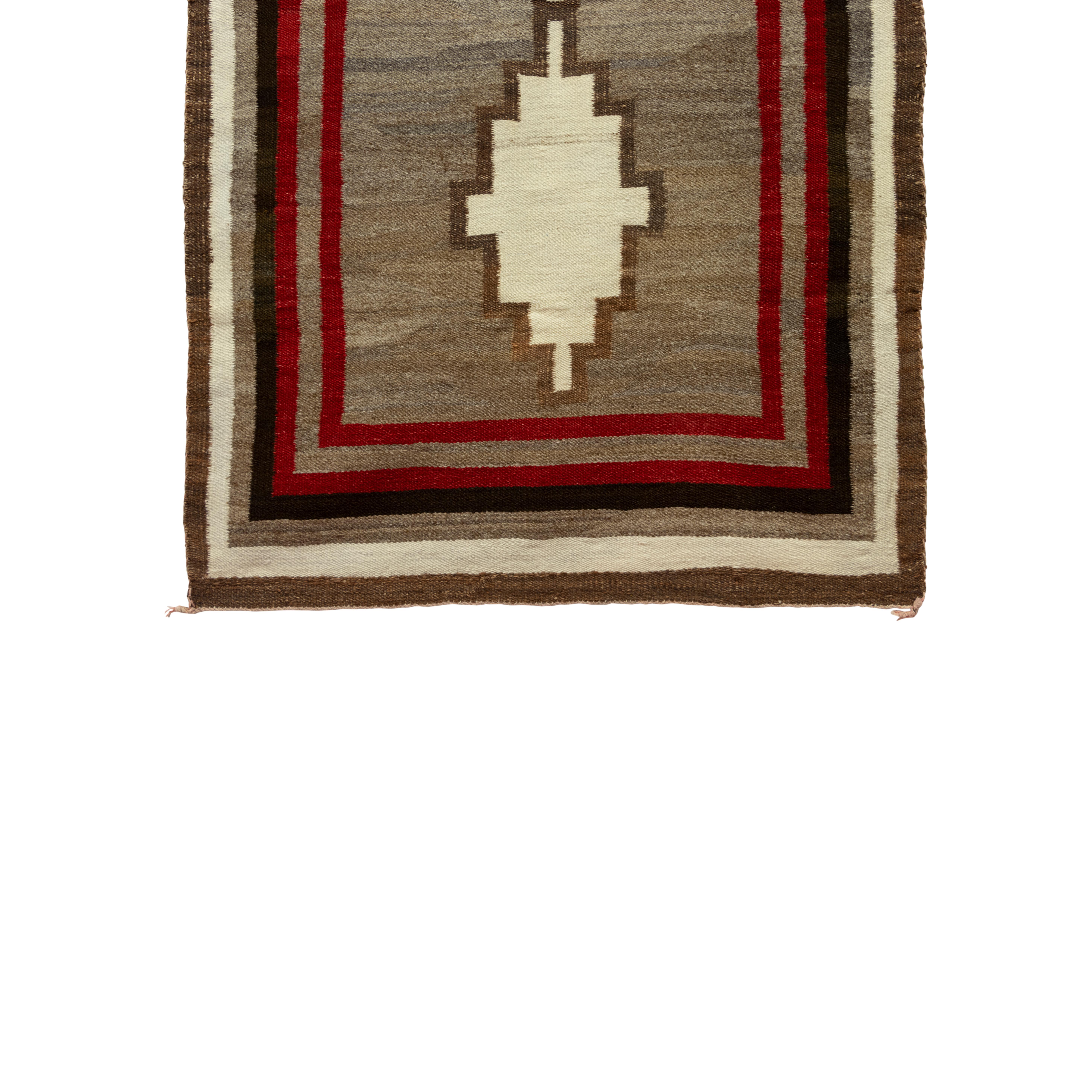 Navajo crystal with seven borders. Nice variegations in the natural brown and dyed red. Measures: 3'4
