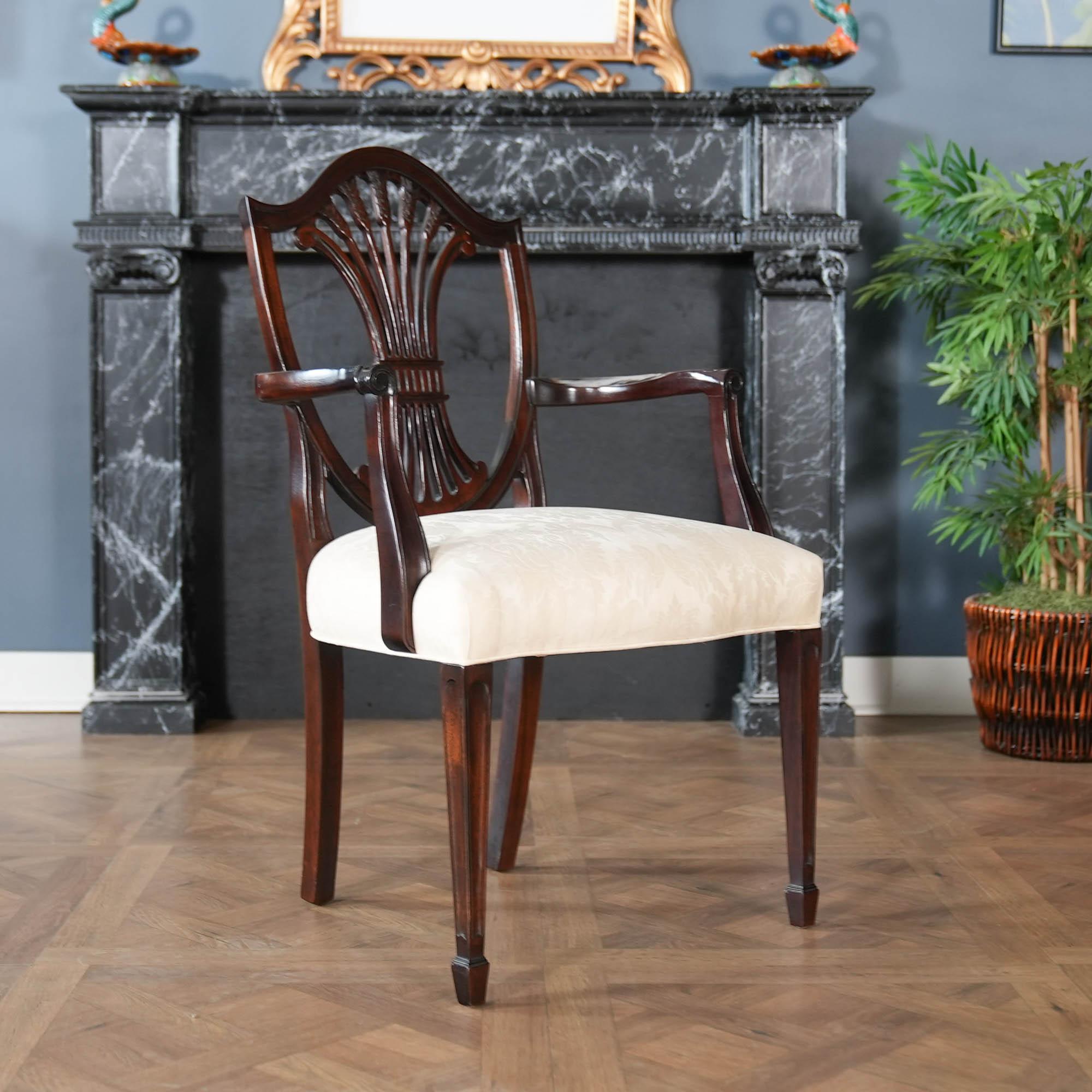 A Vintage Stickley Set of 8 Shieldback Chairs which will be the focal point of any dining room in which they are placed. Hand crafted from solid mahogany this beautiful set of  chairs are in original condition and even appear to have their original