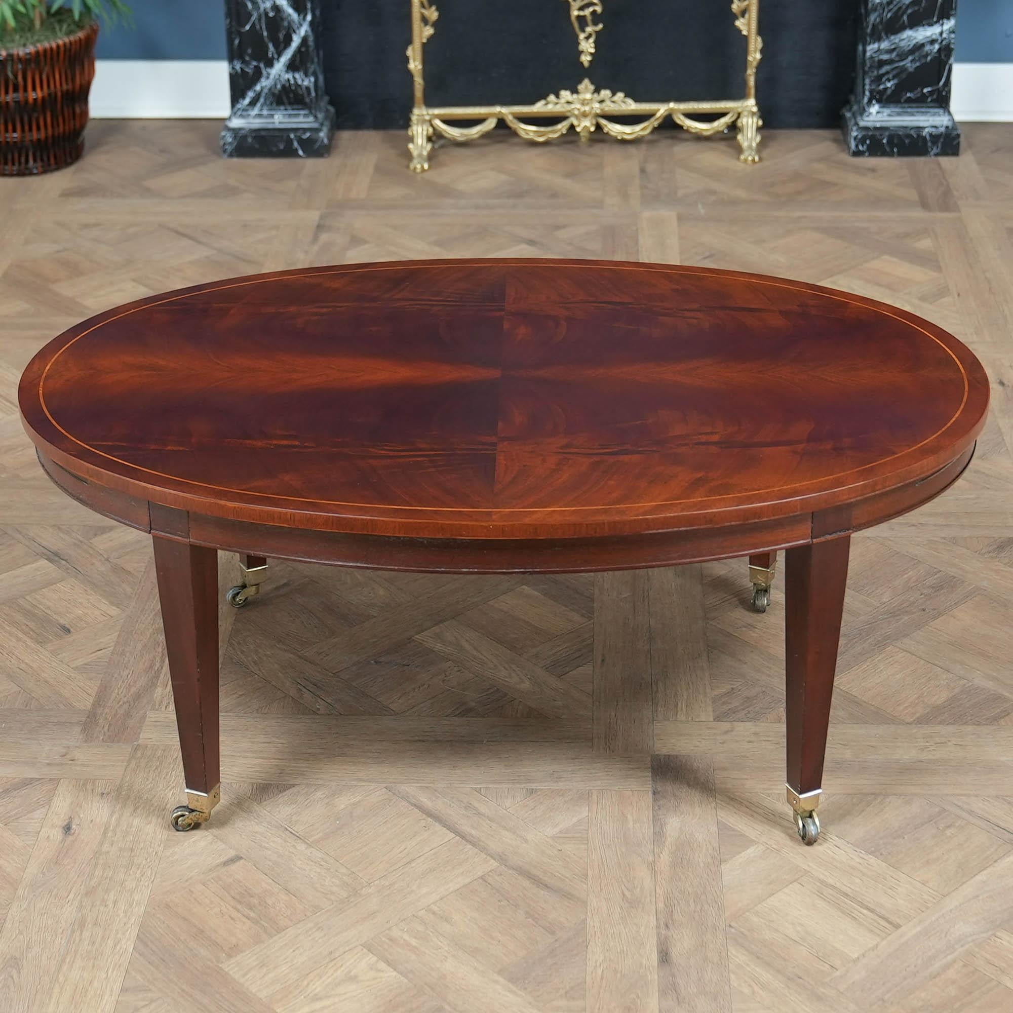 A great quality piece of furniture this Vintage Baker Cocktail Table will be the focal point of your living room. From the beautiful inlaid top with pullout trays to the delicate wheels at the base of the table legs everything on this table works