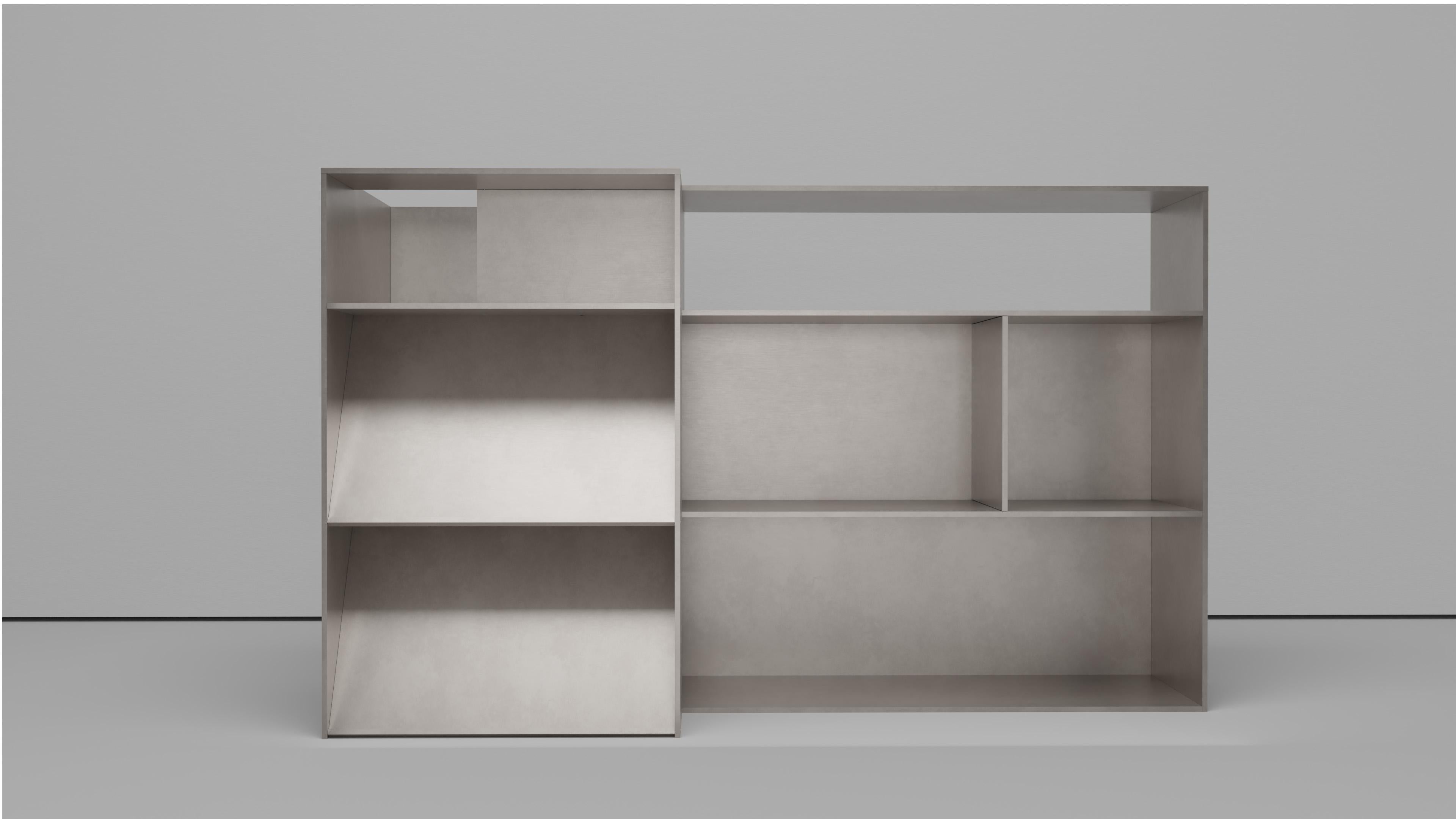 NW Corner Floor Shelf in machine cut 3-8 inch thick aluminum plate. Each element is hand-finished and waxed and bolted together with recessed stainless steel hardware. The underside has a digitally-cut, recessed 1-8 inch delrin foot to protect the