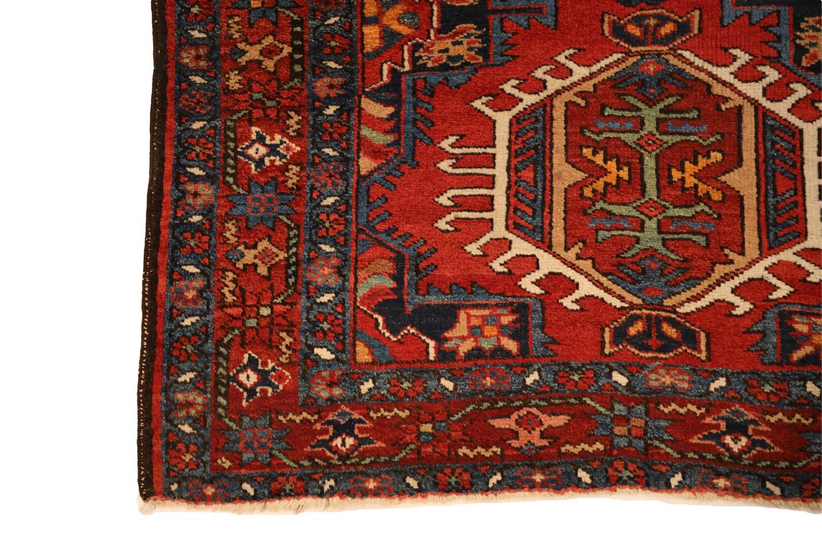 Behold the captivating elegance of a North Western Persian rug, resplendent in its magnificent design and vibrant color palette. This remarkable masterpiece features a rich red background, suffusing the entire rug with warmth and allure.

At the