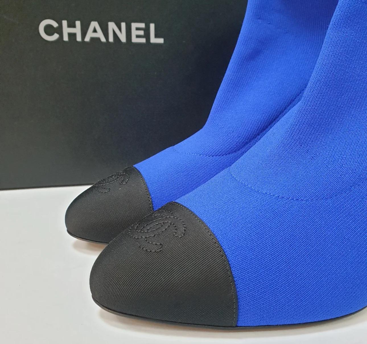 Step out in style with these stunning Chanel 2019 sock booties! These booties feature a gorgeous cobalt blue color and the iconic CC branding on the toe-cap, adding a touch of luxury to any outfit. 

The 9 cm heel offers the perfect amount of lift,