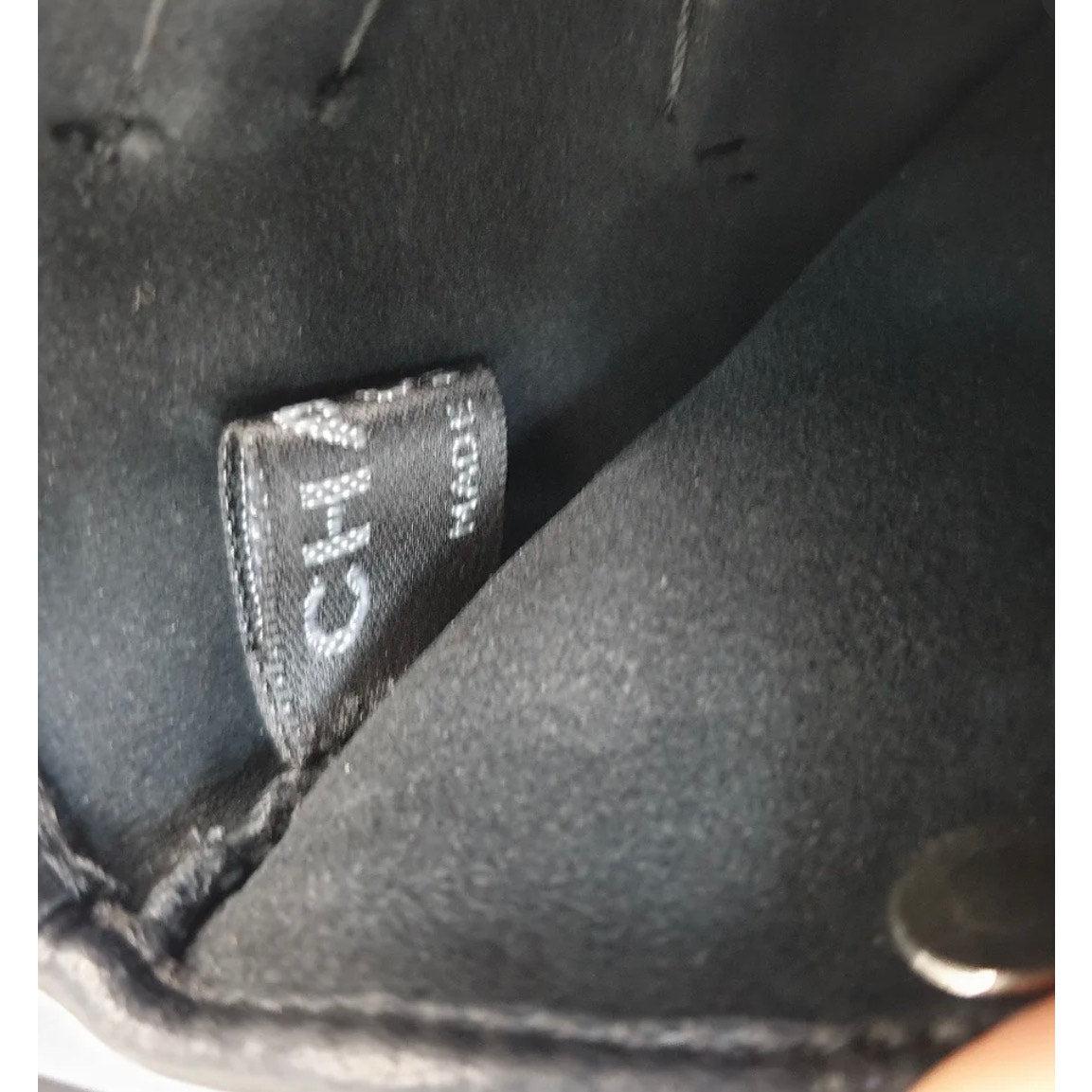 NWOB CHANEL Lammfell Schwarz CC Logo Bogen Fingerlose Handschuhe Fäustlinge  -7.5 im Angebot 1