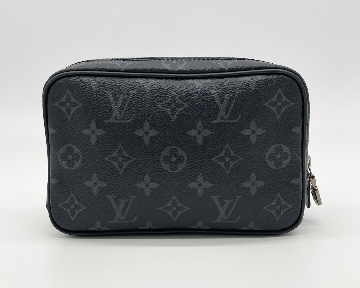 new without tags Louis Vuitton Black Monogram Eclipse Canvas Toiletry Pouch in excellent condition. Black monogram eclipse canvas exterior with top zipper closure. black leather interior. no stain smells or scuffs. clean corners edges and interior