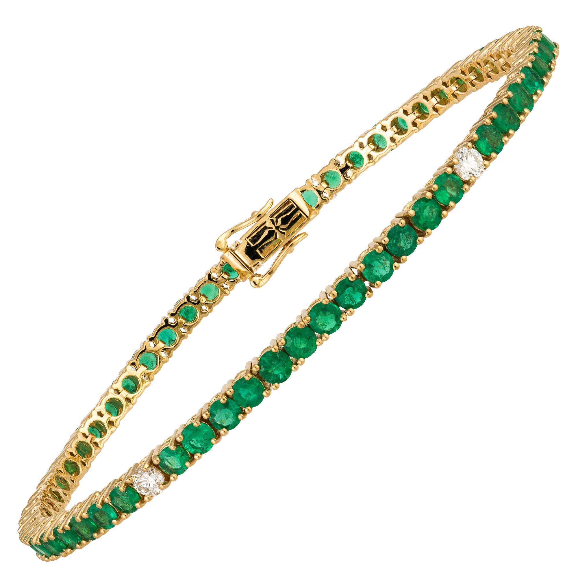 The Following Item we are offering is a Rare 18KT Gold Emerald and Diamond Tennis Bracelet. Bracelet is comprised of Finely Set Gorgeous Glittering Round Emeralds and Diamonds!!! T.C.W. Approx 6.75CTS!! The Emeralds and Diamonds are of Exquisite and