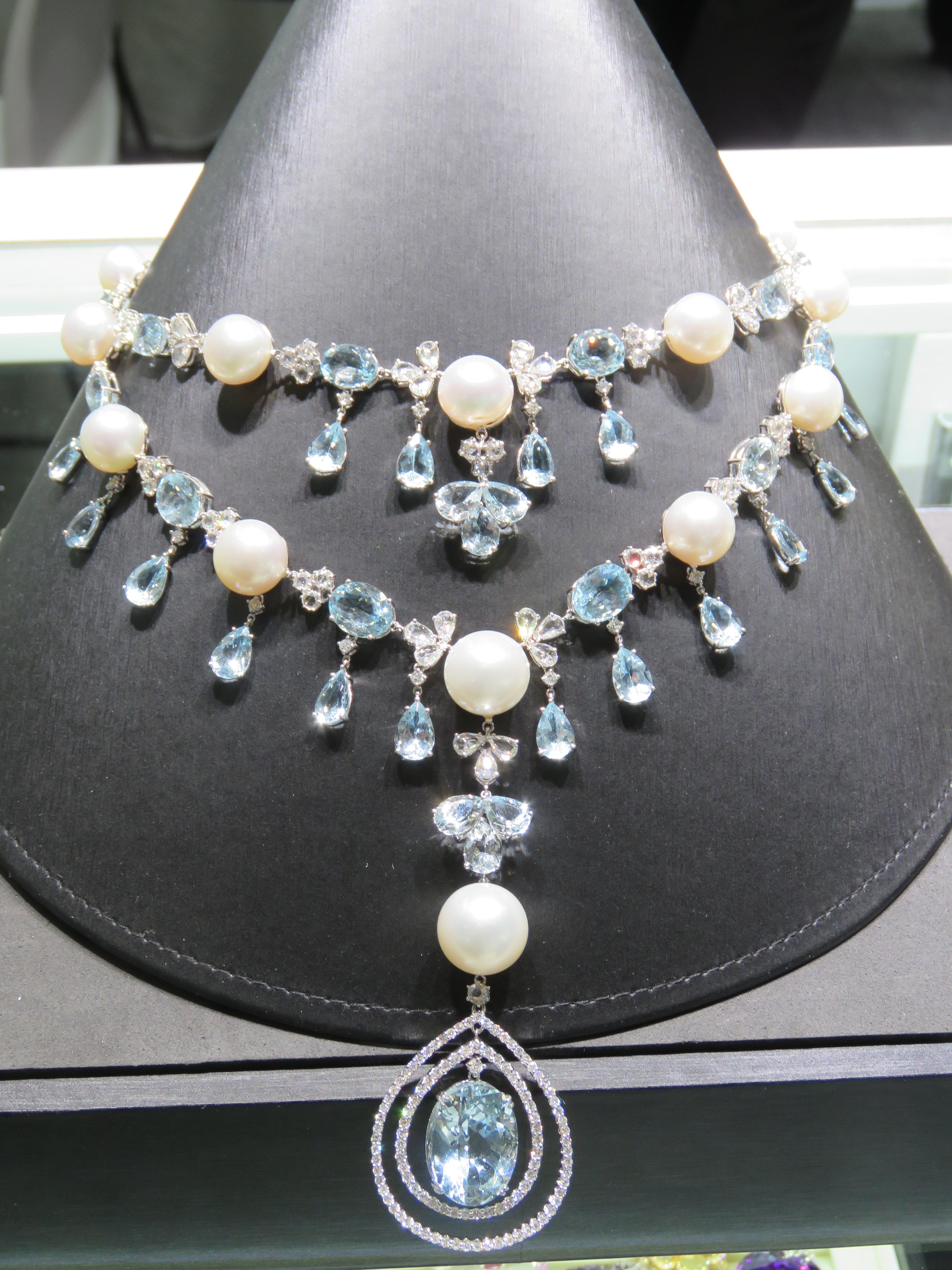 The Following Item we are offering is this Beautiful Rare Important 18KT Gold Fancy South Sea Pearl Diamond Aquamarine Necklace. Necklace is comprised of 17 Magnificent High Luster Large AA-AAA SOUTH SEA PEARLS that give off a Radiant Hue.