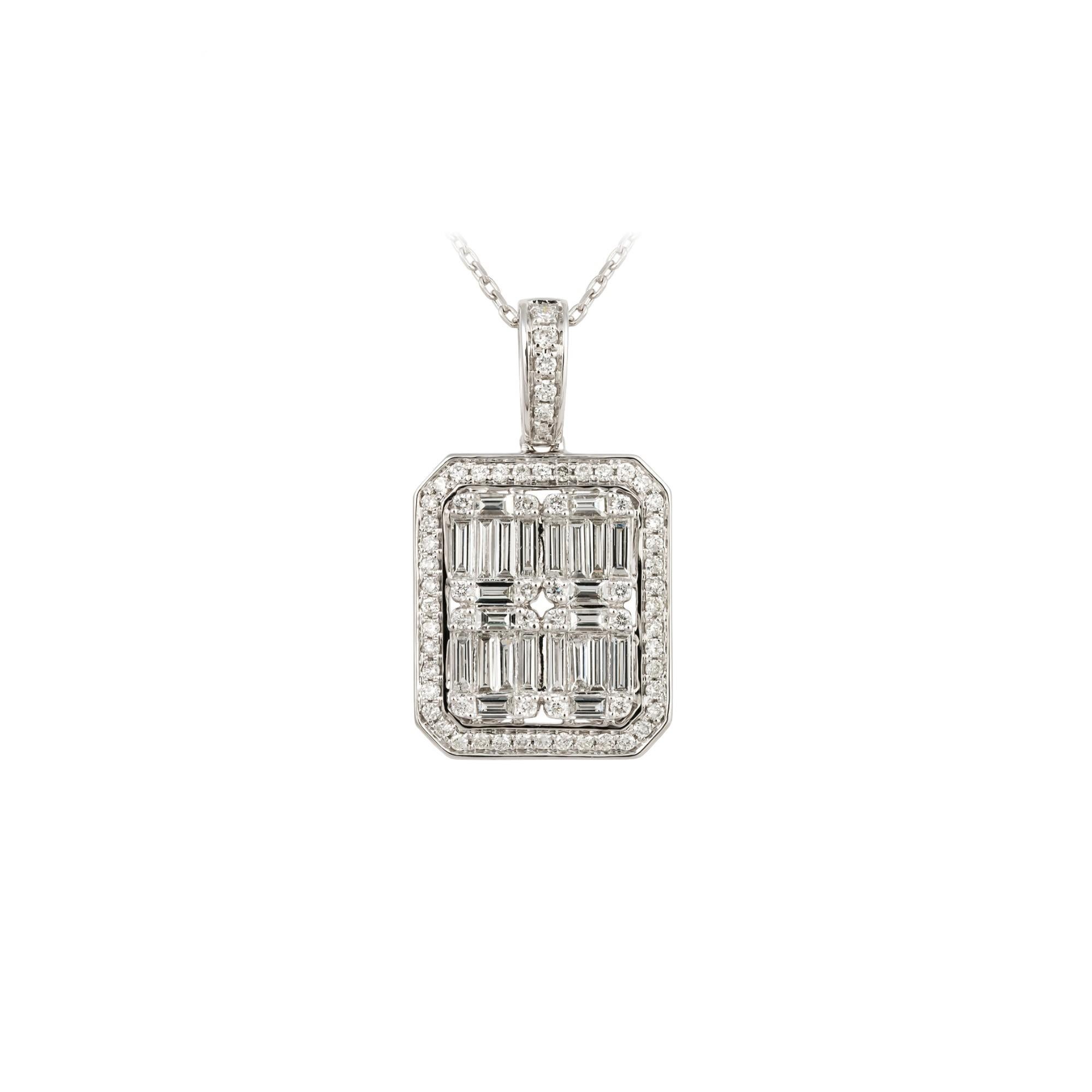 The Following Item we are offering is a Rare Important Radiant 18KT Gold Rare Gorgeous Fancy Baguette Diamond Pendant Necklace. Necklace is comprised of a Gorgeous Fancy Baguette Cut Trillion Cut Diamonds surrounded and adorned with a Beautiful Halo