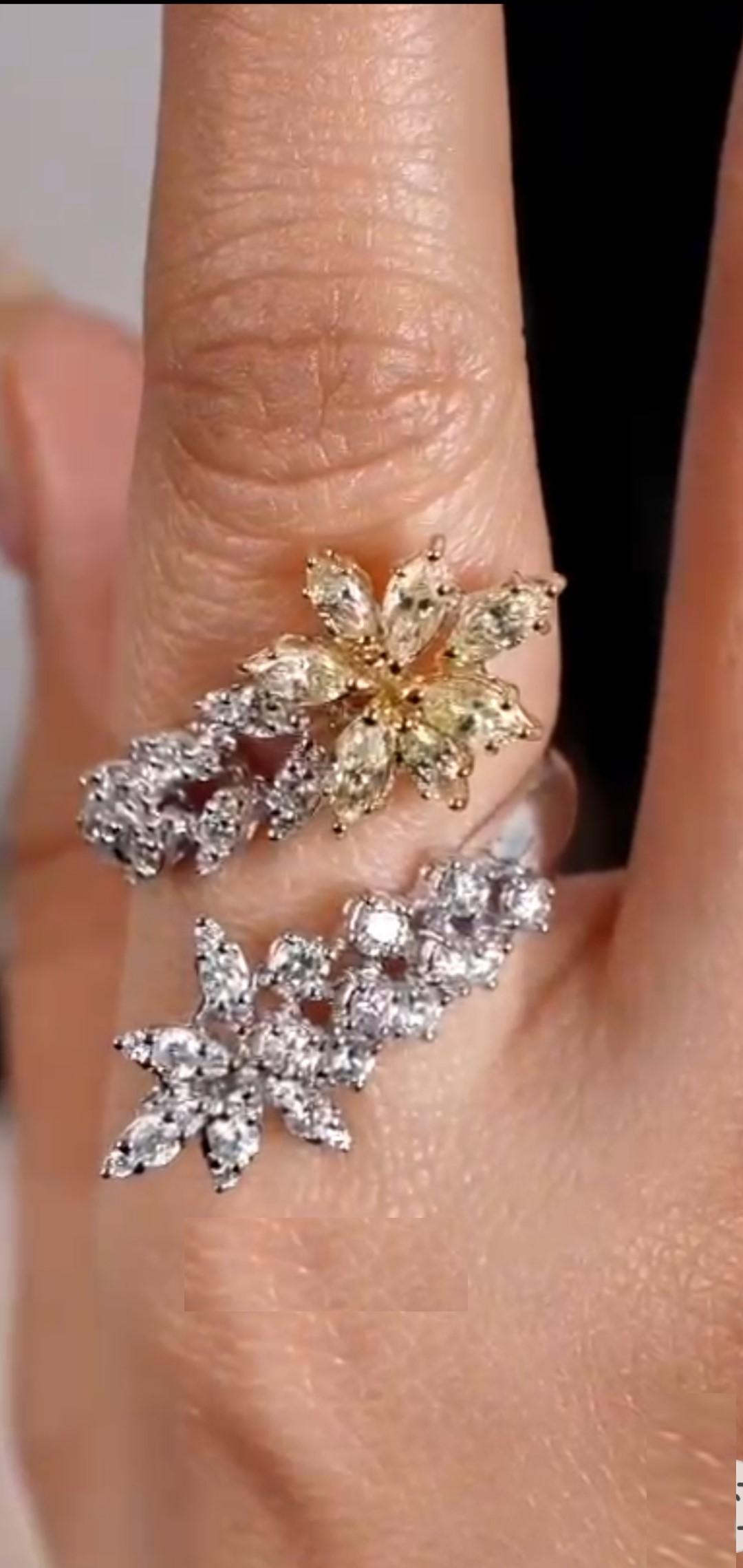 Das folgende Element, das wir anbieten, ist diese schöne seltene wichtige 18KT Gold große glitzernde Fancy Cut gelben Diamanten weißen Diamanten Floral Flower Crossover Ring. Ring besteht aus ca. 2CTS von Magnificent Rare Gorgeous Marquise Cut Fancy