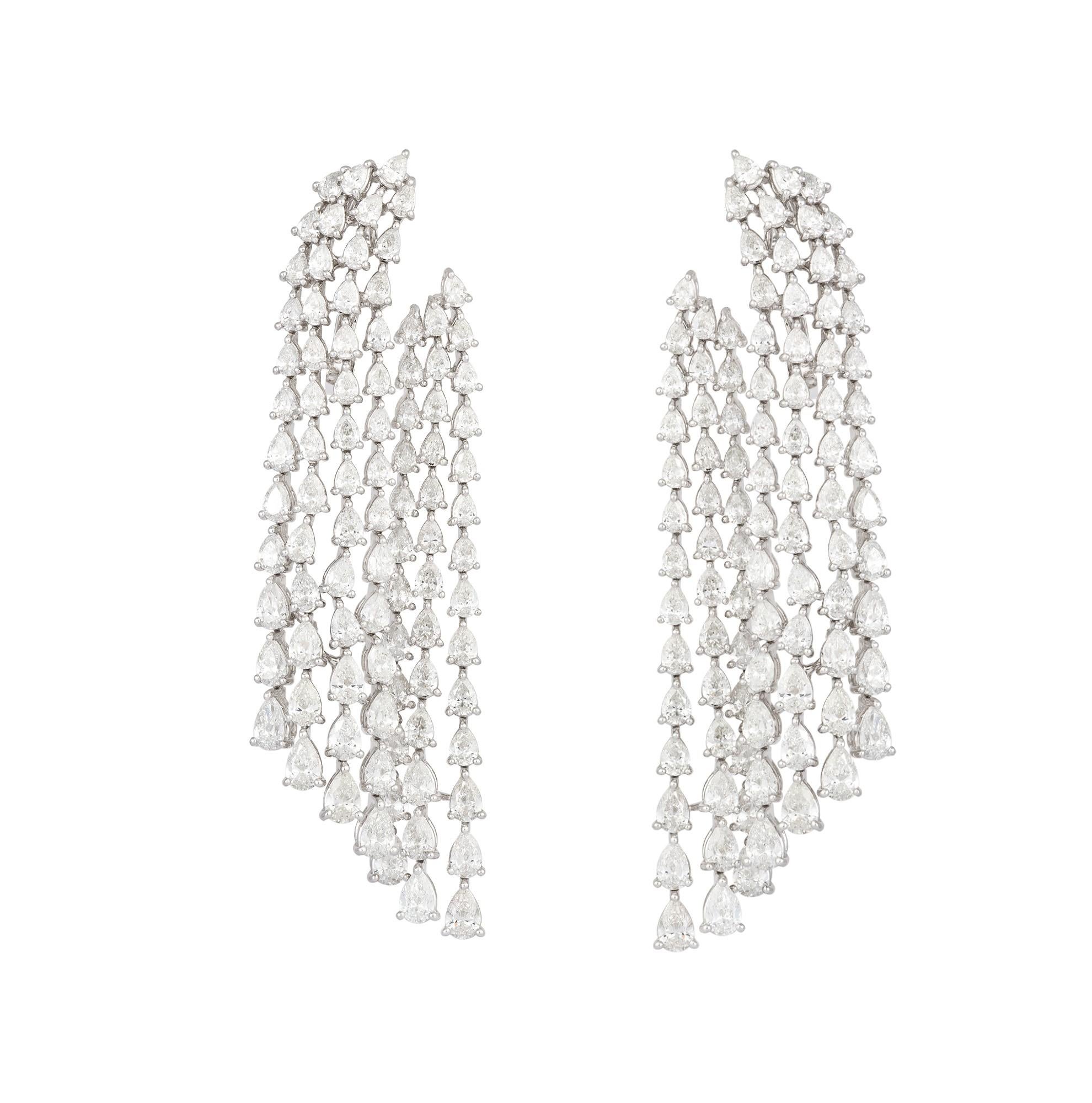 The Following Items we are offering is a Pair of Rare 18KT Gold Fancy White Diamond Dangle Earrings. Earrings are comprised of Finely Set Gorgeous Glittering Fancy White Diamonds!!! T.C.W. Approx 16.20CTS!! These Gorgeous Earrings are a Rare Sample