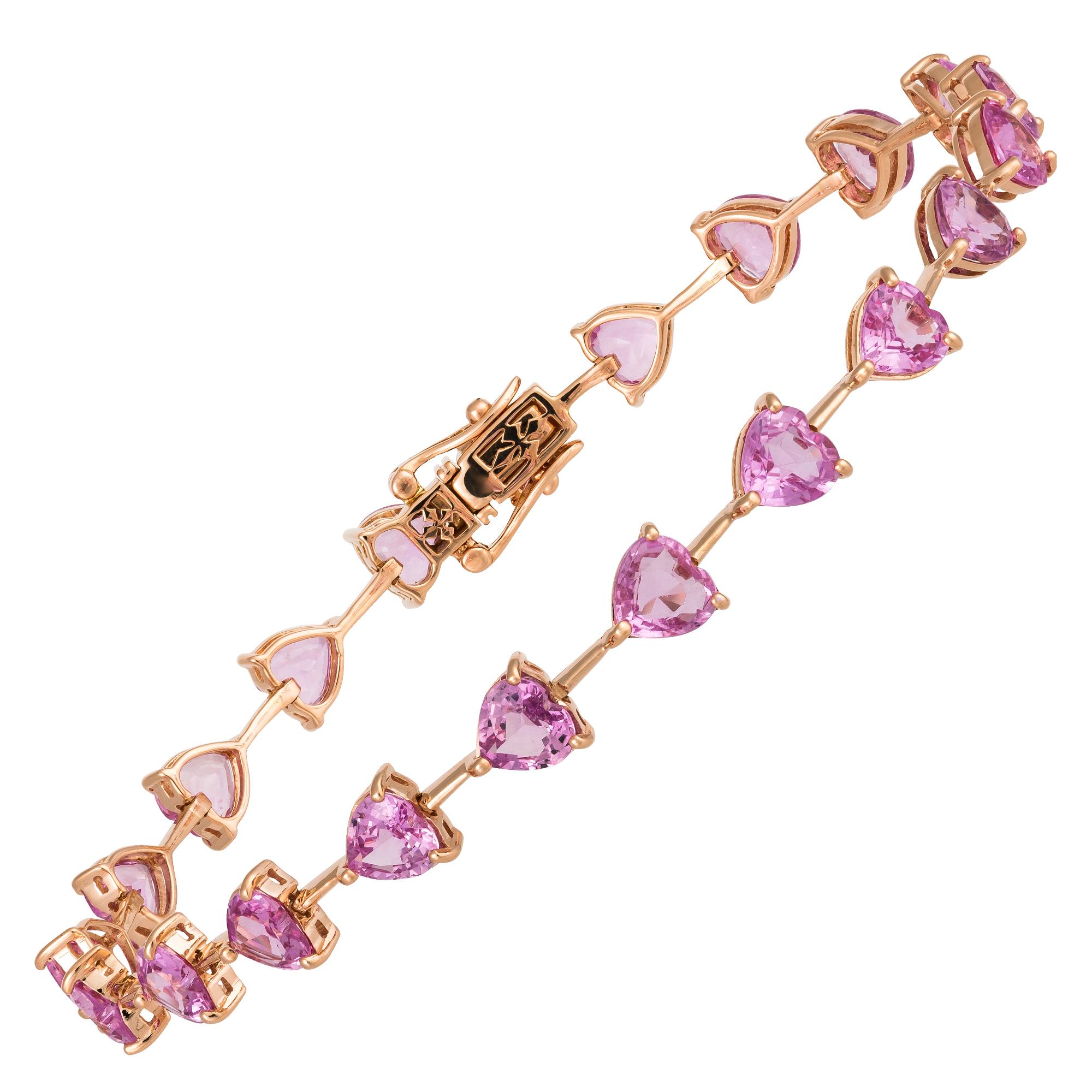 The Following Item we are offering is this Rare Important Radiant 18KT Gold Gorgeous Glittering and Sparkling Magnificent Fancy Heart Cut Pink Sapphire Bracelet. Bracelet contains approx 12CTS of Gorgeous Glittering Fancy Heart Cut Pink Sapphires!!!
