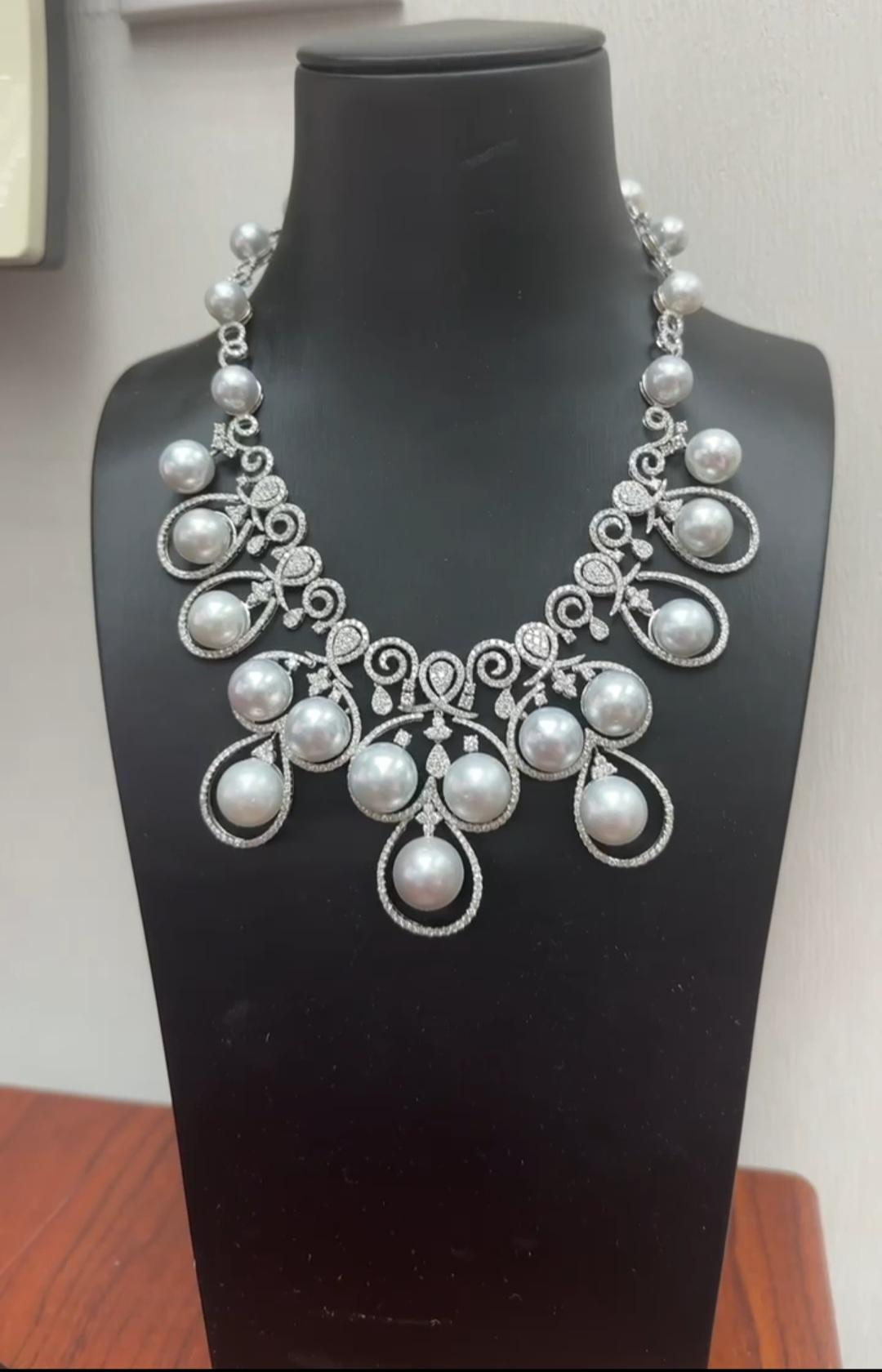 The Following Item we are offering is this Extremely Rare Beautiful 18KT Gold Fine Rare Large White South Sea Pearl Fancy Diamond Necklace. This Magnificent Necklace is comprised of Rare Fine Large AA-AAA 10-11MM South Sea Pearls with Gorgeous