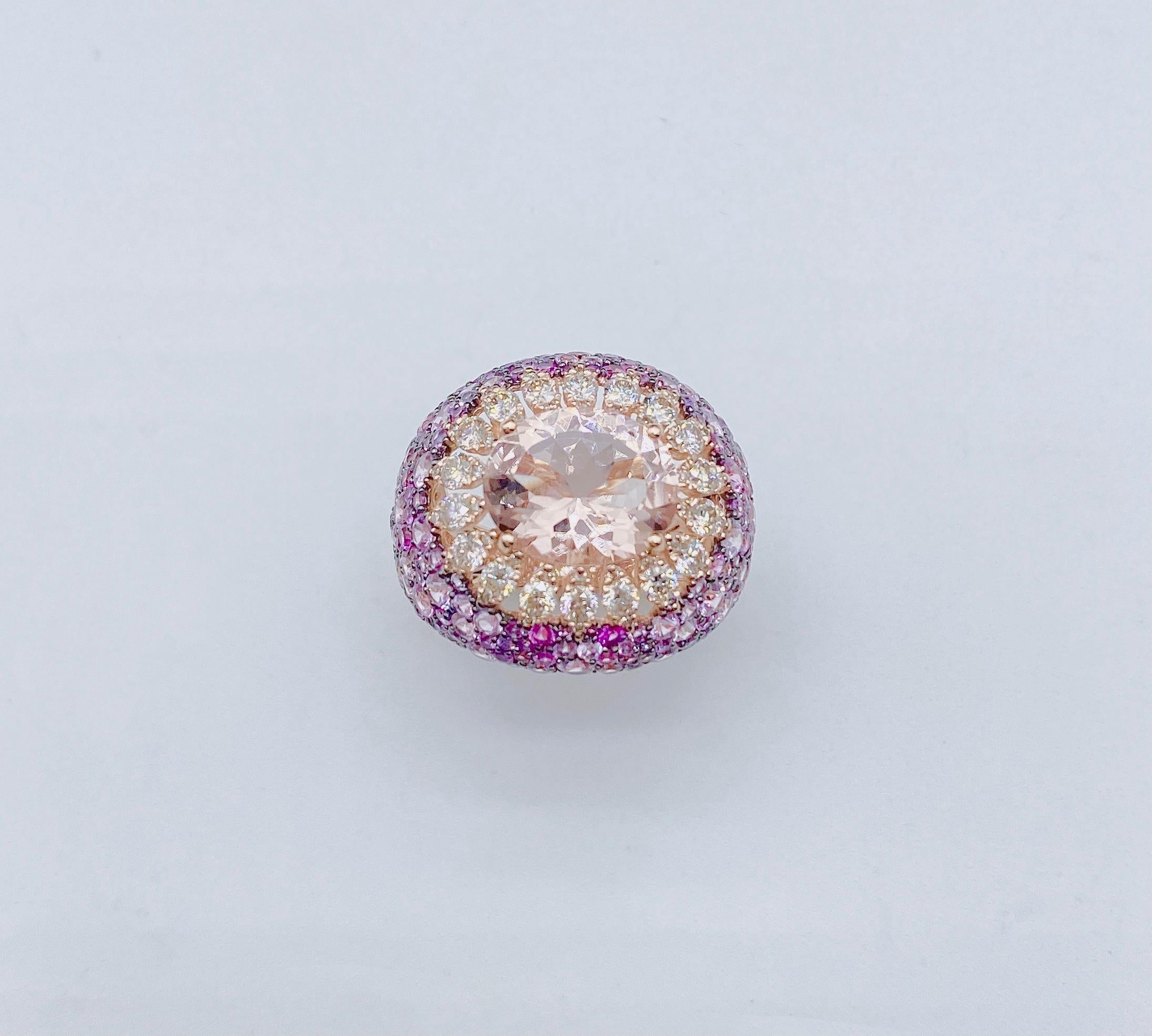 The Following Item we are offering is a Rare Important Radiant 18KT Gold Large Fancy Glittering Morganite, Pink Sapphire, and Diamond Ring. Ring is comprised of A LARGE Gorgeous Fancy Morganite sitting atop Beautiful Glittering Fancy Pink Sapphires