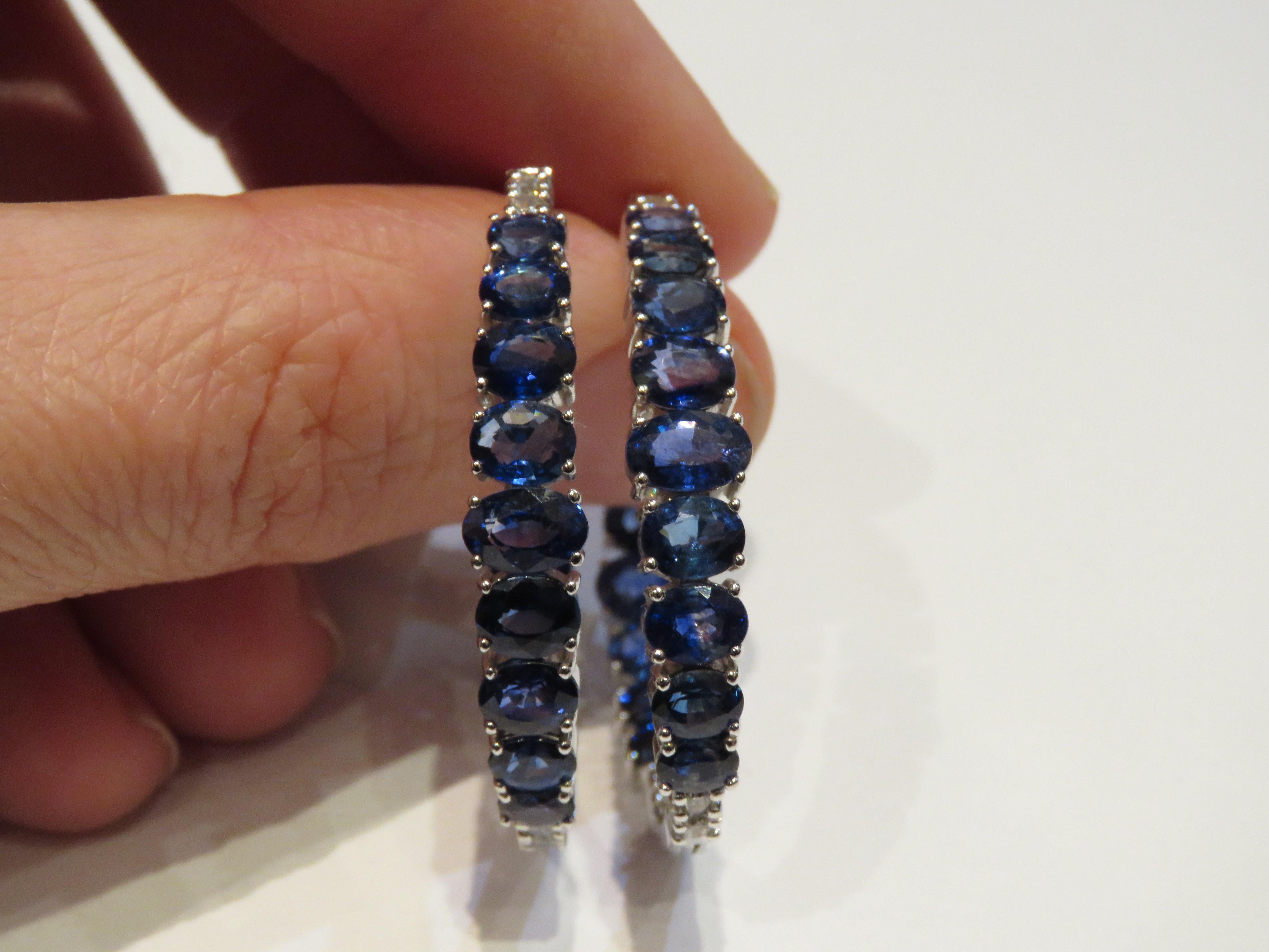 The Following Item we are offering are these Extremely Rare Beautiful 18KT Gold Fine Large Blue Sapphire Hoops comprised of approx 13CTS Carats of Fine Gorgeous Glittering Oval Blue Sapphires and Diamonds!! The Sapphires and Diamonds are of