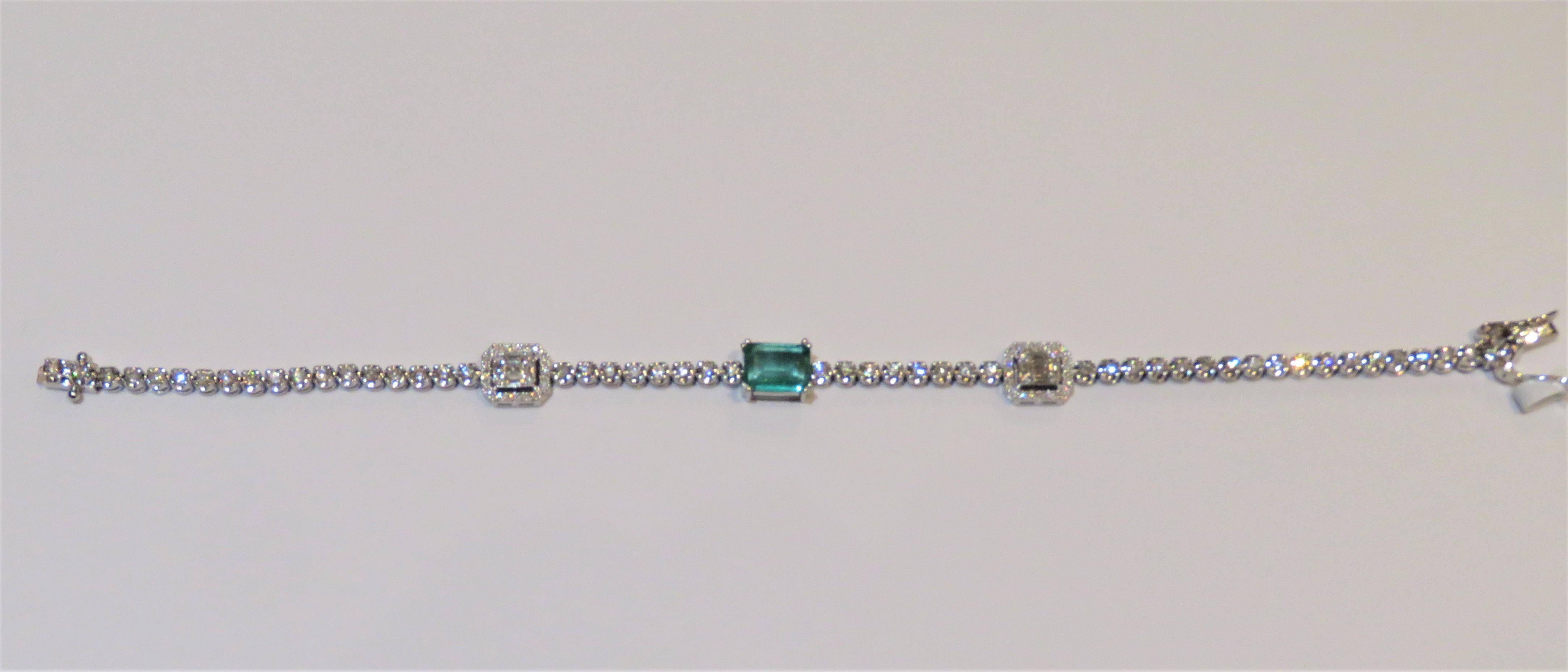 The Following Item we are offering is this Rare Important Radiant 18KT Gold Gorgeous Glittering and Sparkling Magnificent Fancy Shaped Green Emerald and Diamond Bracelet. Bracelet Contains approx 3CTS of Beautiful Fancy Emerald Cut Green Emerald and