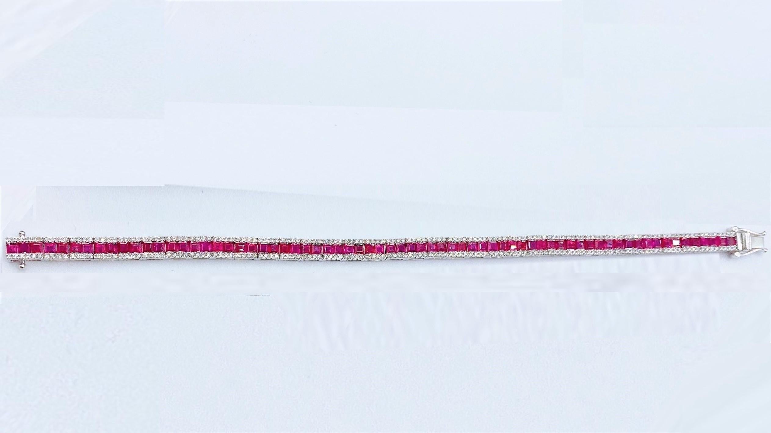 The Following Item we are offering is this Beautiful Rare Important 18KT Gold Sparkling Princess Cut Ruby and Diamond Bracelet. FEATURING Magnificent Rare Gorgeous Fancy Princess Cut Rubies Framed with Diamonds!!! 
The Diamonds and Rubies are of