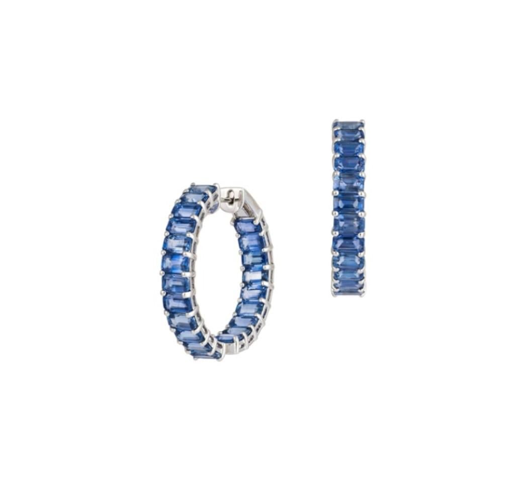 The Following Items we are offering is this Rare Important Radiant 18KT Gold Gorgeous Glittering and Sparkling Magnificent Fancy Emerald Cut Blue Sapphire Hoop Earrings. Earrings contain approx 14.50CTS of Beautiful Fancy Emerald Cut Blue
