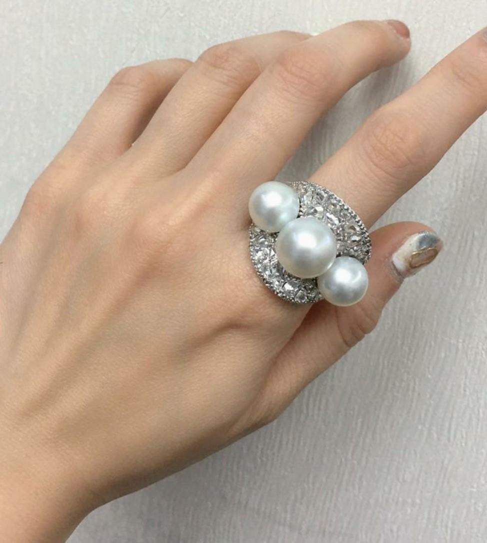 The Following Item we are offering is this Extremely Rare Beautiful 18KT Gold Fine Large Triple 3 White South Sea Pearl Fancy Diamond Ring. This Magnificent Ring is comprised of Rare Fine Fancy Rose Cut and Round Gorgeous Glittering Diamonds!!! The