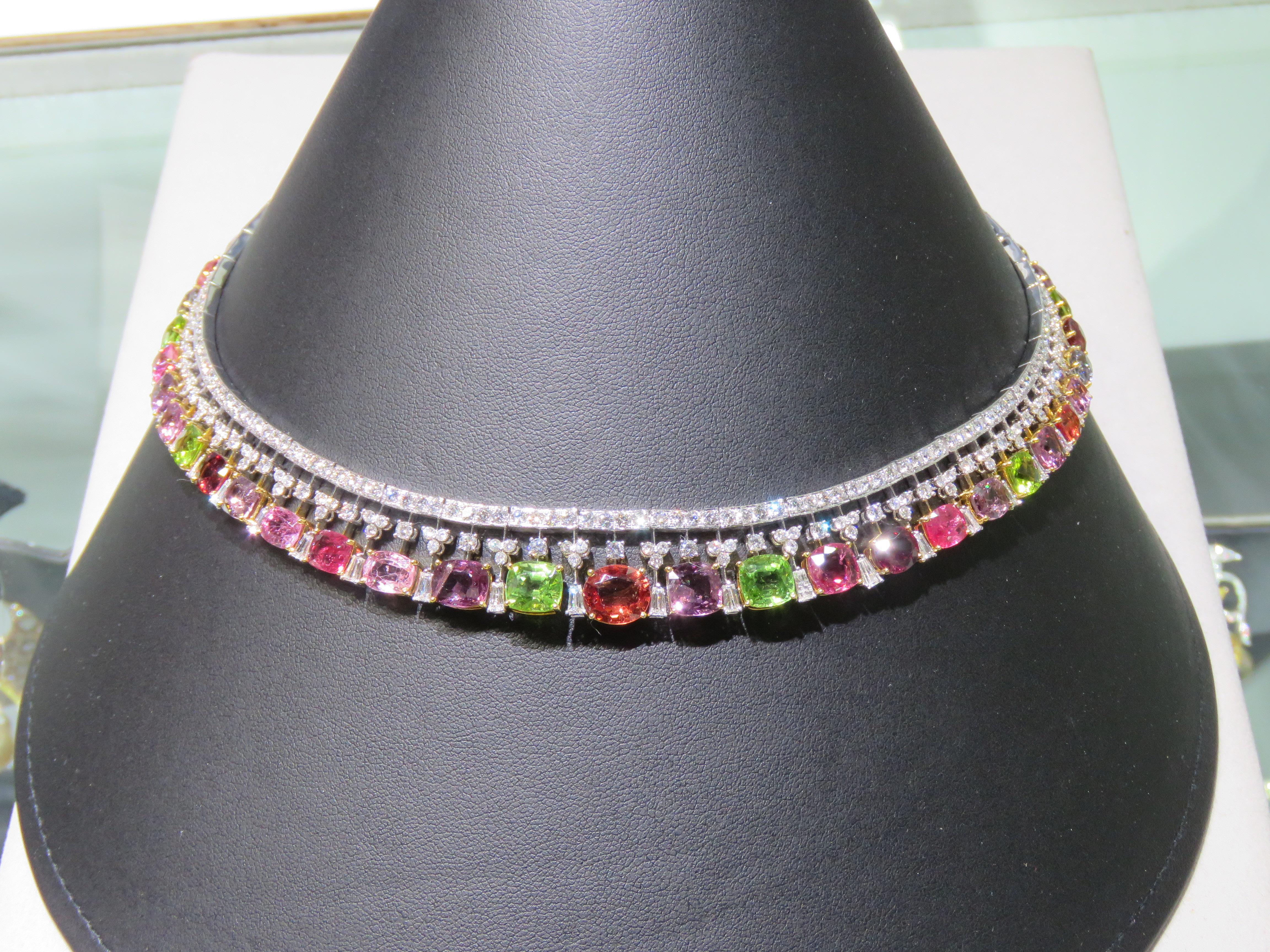 The Following Item we are offering is a Rare 18KT White Gold Large Fancy Color Spinel Jeweled Diamond Peridot Necklace. Necklace is comprised of Finely Set Gorgeous Glittering Fancy Colored Spinels, Peridots, and Diamonds!! T.C.W. Approx 75CTS!!