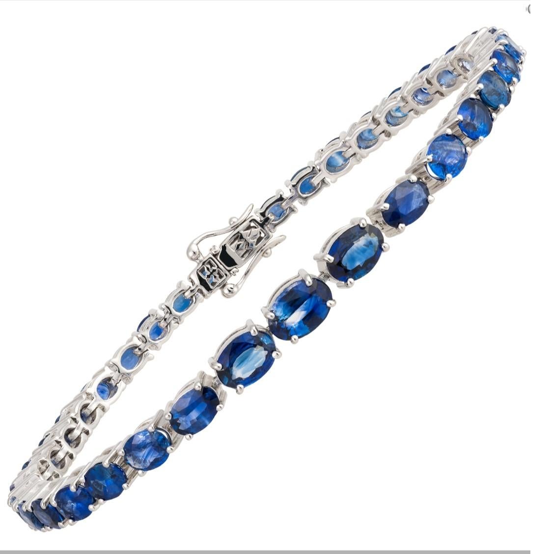 The Following Item we are offering is a Rare Important Radiant 18KT Gold Rare Gorgeous Fancy Oval Blue Sapphire Bracelet. Bracelet is comprised of a Gorgeous Array of Fancy Oval Blue Sapphires. T.C.W. Over 11CTS!!! This Gorgeous Bracelet is a Rare