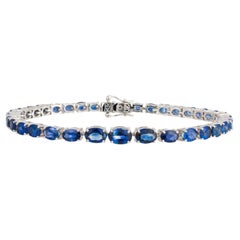NWT $14, 000 18KT Gold Fancy Glittering Large Blue Sapphire Tennis Bracelet