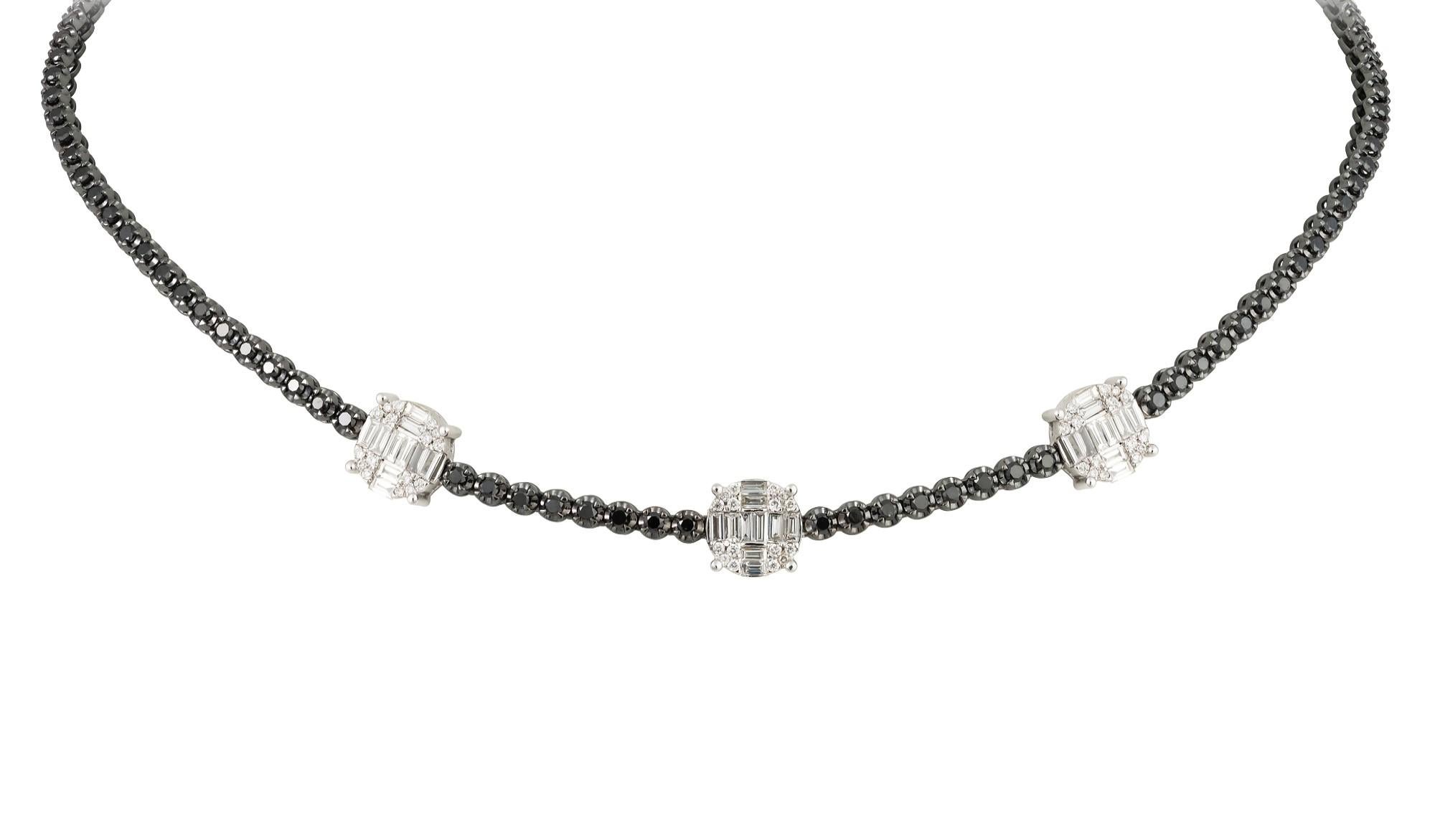 The Following Item we are offering is a Important Radiant 18KT Gold Rare Fancy Black Diamond White Diamond Gorgeous Adjustable Necklace. Necklace is comprised of Fancy Black Diamonds interlocking with 3 Large White Diamond Clusters. T.C.W. Approx