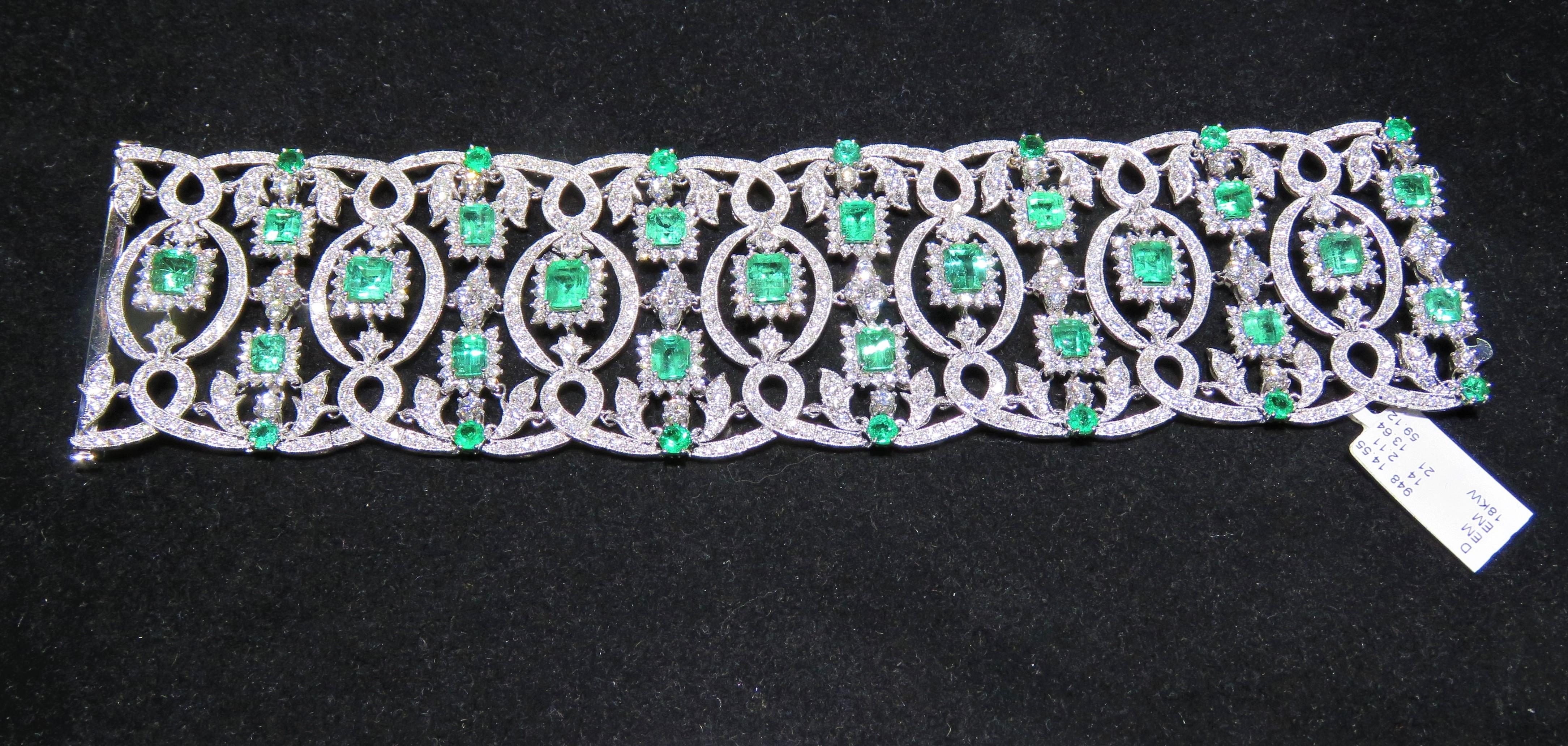 The Following Items we are offering is a Pair of Rare 18KT Gold Emerald Diamond Bracelet. Bracelet is comprised of Finely Set Gorgeous Glittering Emeralds and Diamonds!!! T.C.W. Approx 30CTS. The Emeralds and Diamonds are of Exquisite and Fine